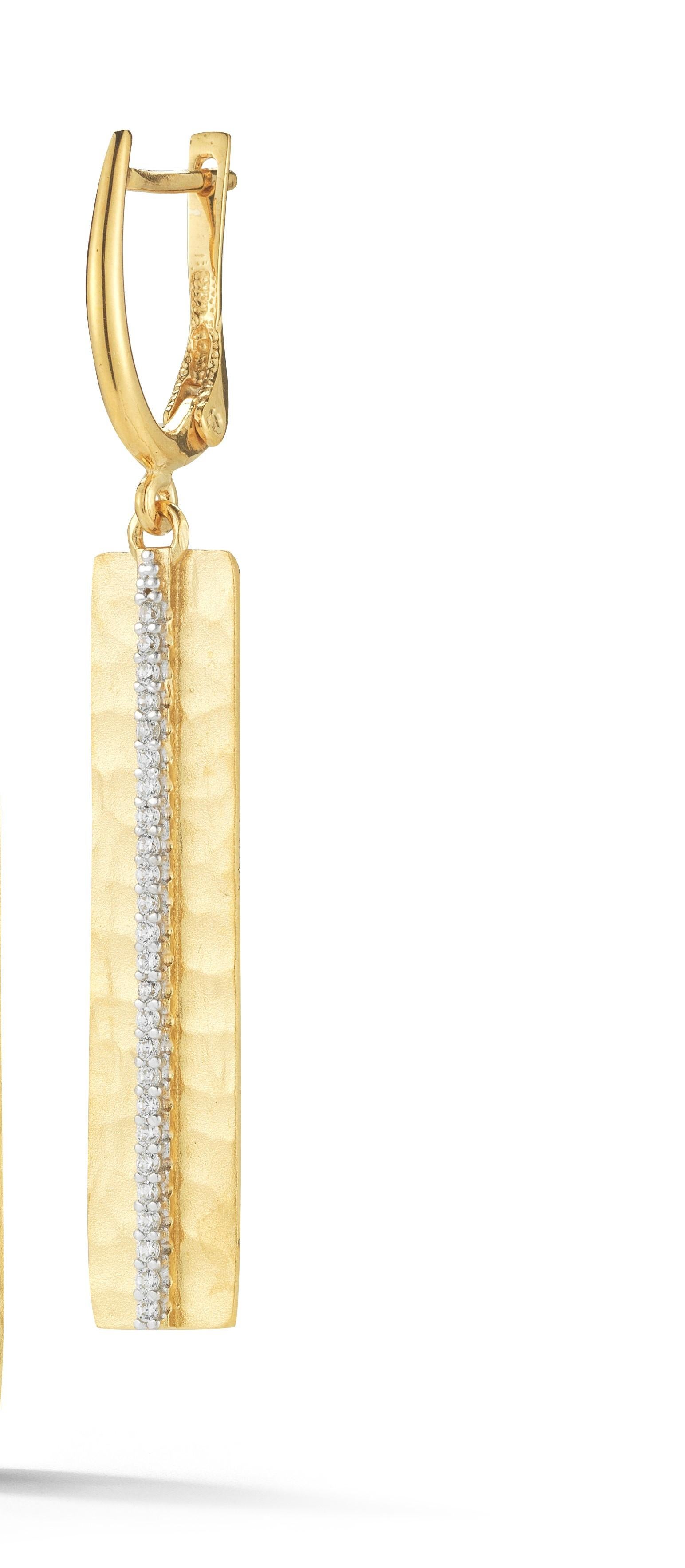 14 Karat Yellow Gold Hand-Crafted Matte And Hammer-Finished Dog Tag Earrings, Accented With 0.30 Carats Of Pave Set Diamonds, and Dangling on a Leverback Backfinding.
