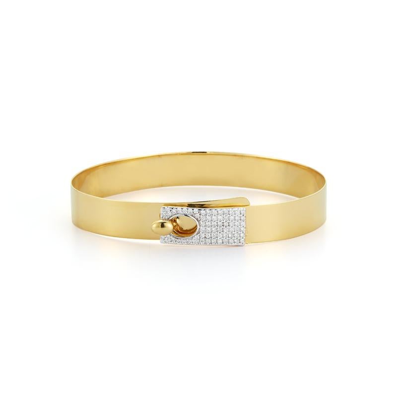 14 Karat Yellow Gold Hand-Crafted Polish-Finished 8mm Buckle Cuff Bracelet, Accented with 0.42 Carats of Pave Set Diamonds.
