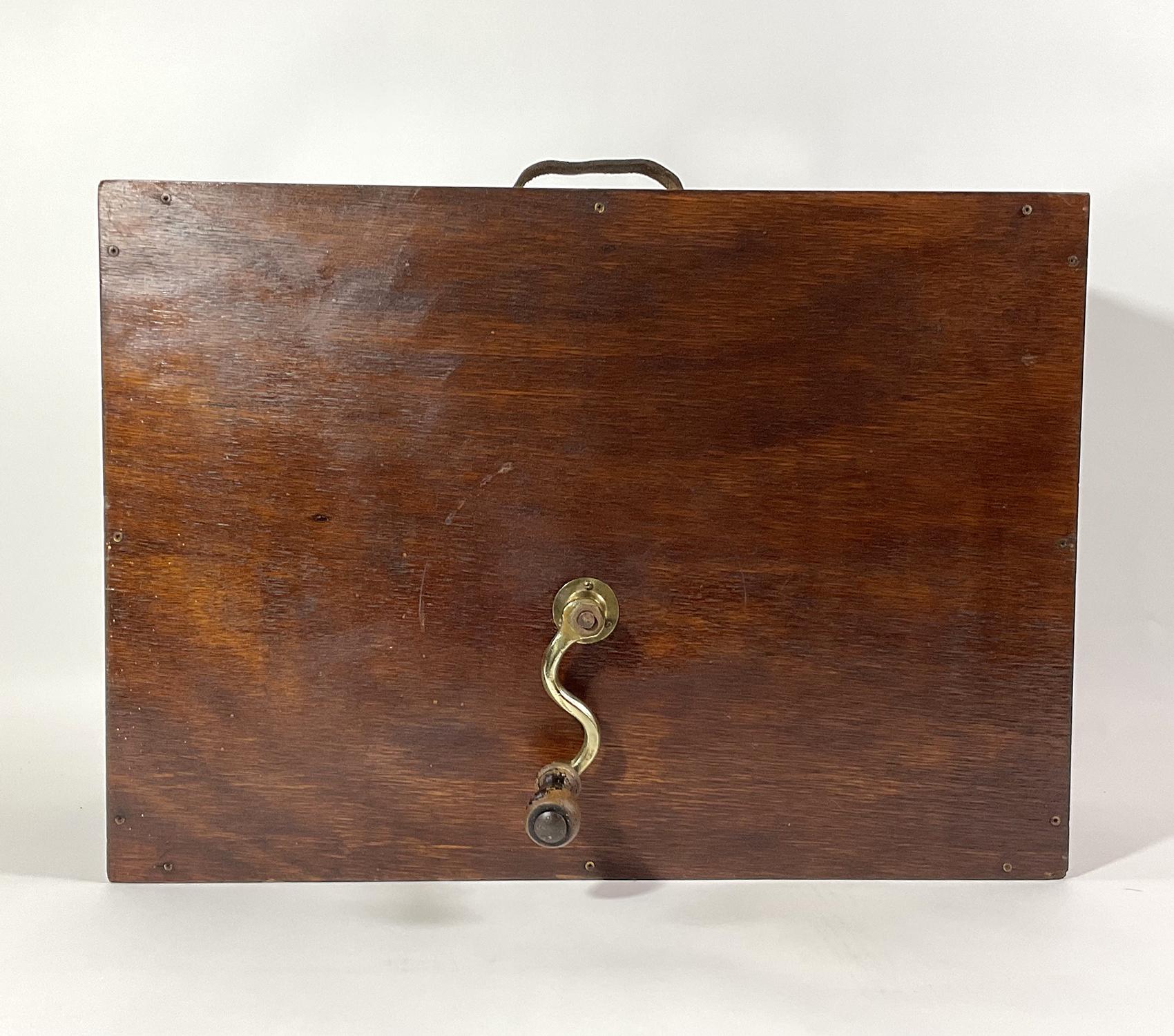 Ships foghorn with mahogany box with brass crank handle. Leather carry handle. Circa 1950.