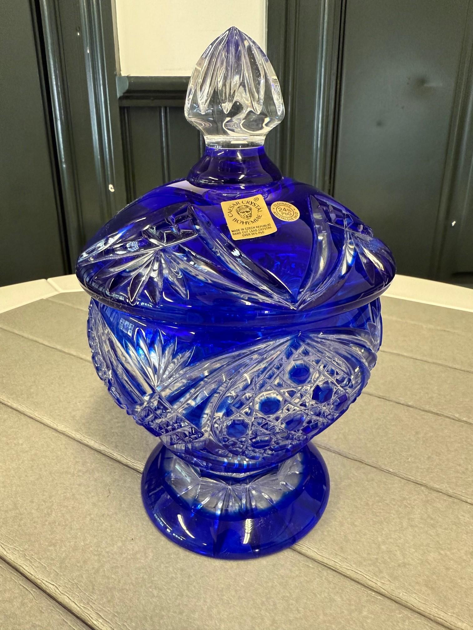 Stunning hand cut lead crystal pedestal candy dish with a cover created as a work of art by the hands of the finest Czech glass workers. The Caesar Crystal Company in the Czech Republic has been selling hand cut lead crystal pieces since 1861 and is