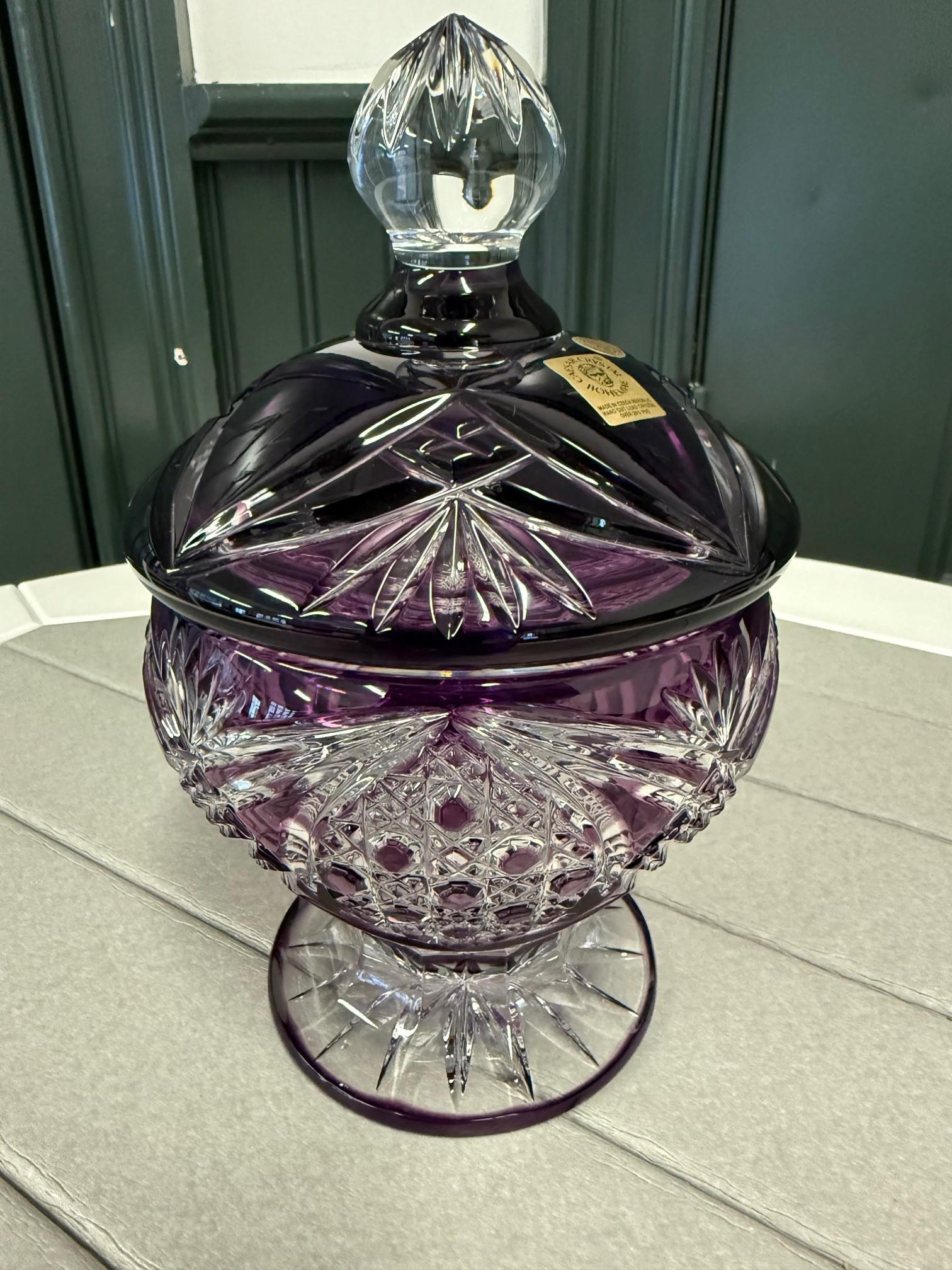 Stunning hand cut lead crystal amethyst or purple pedestal candy dish with a cover created as a work of art by the hands of the finest Czech glass workers. The Caesar Crystal Company in the Czech Republic has been selling hand cut lead crystal