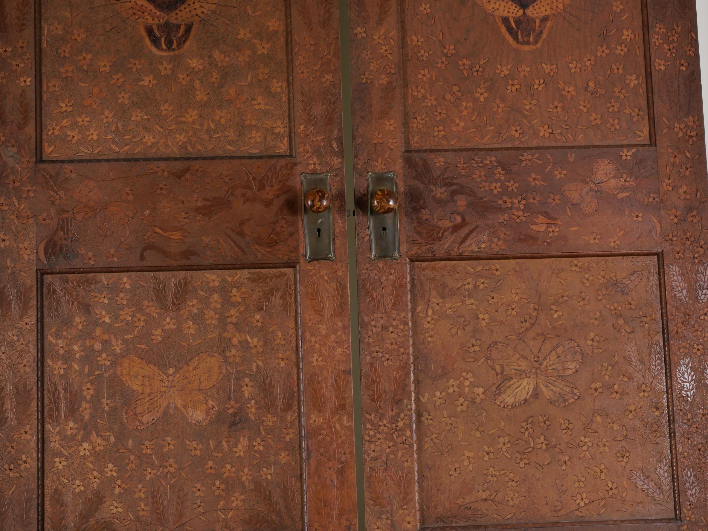 Carved Hand-decorated doors, a pair For Sale