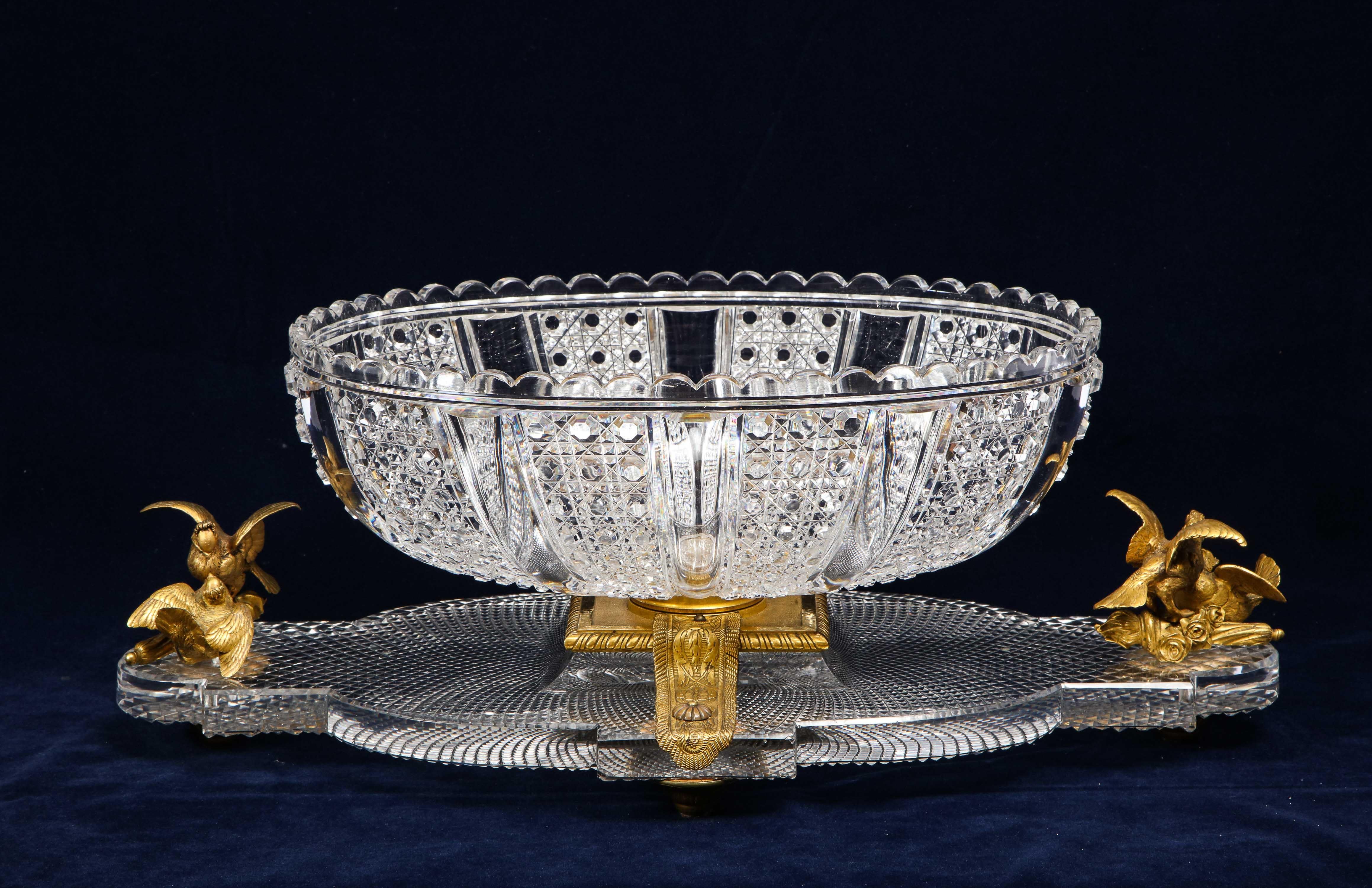 A magnificent museum quality French 19th century hand-diamond cut crystal and ormolu-mounted Baccarat centerpiece/surtout de table in the Louis XVI style. This is truly an exemplary piece. The crystal center bowl is all hand-diamond cut with