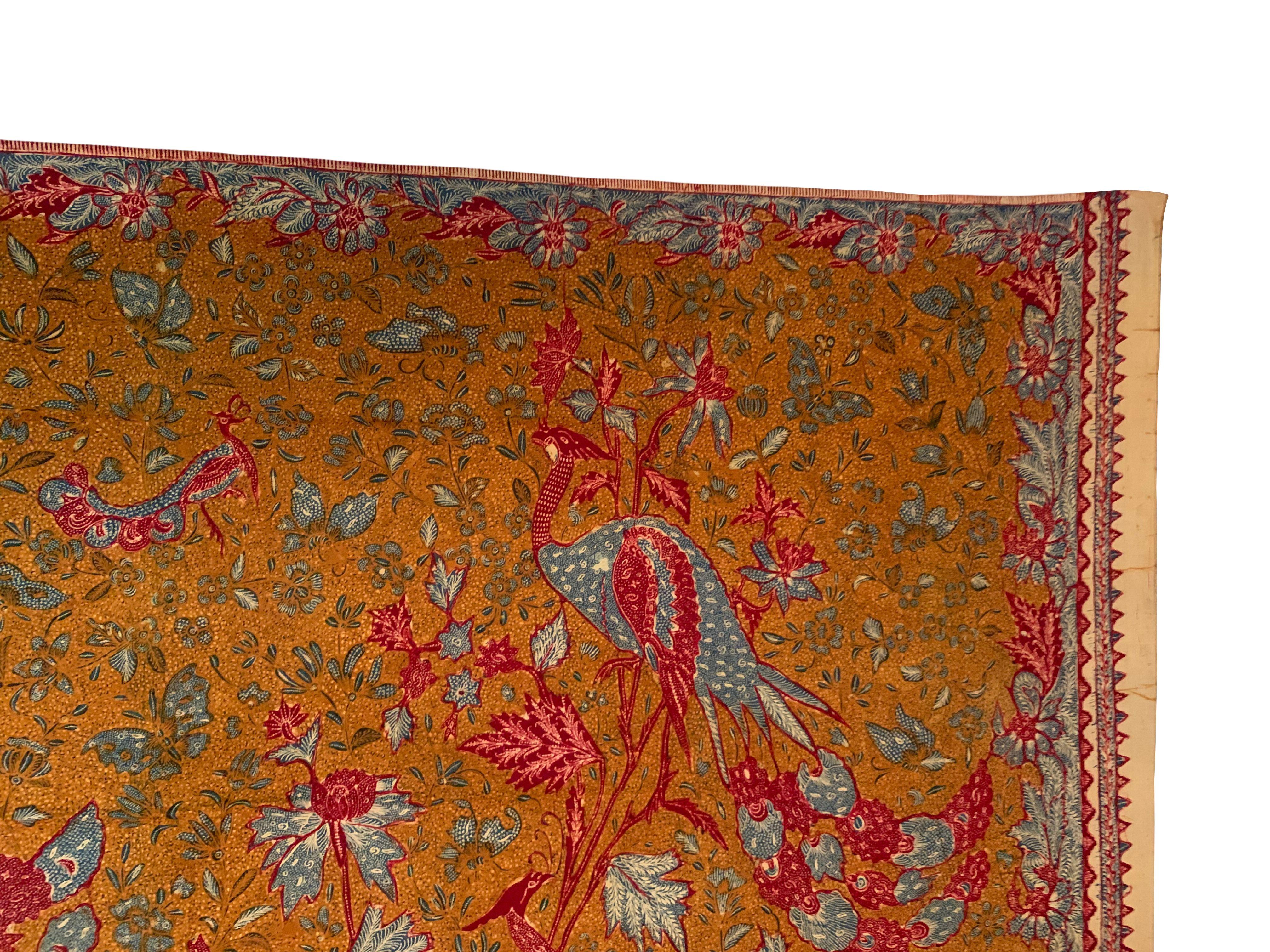 A fine example of a batik textile from Solo, Java, Indonesia. This textile features wonderful detailing & contrast. It features a wonderful array of floral and bird motifs throughout. 

