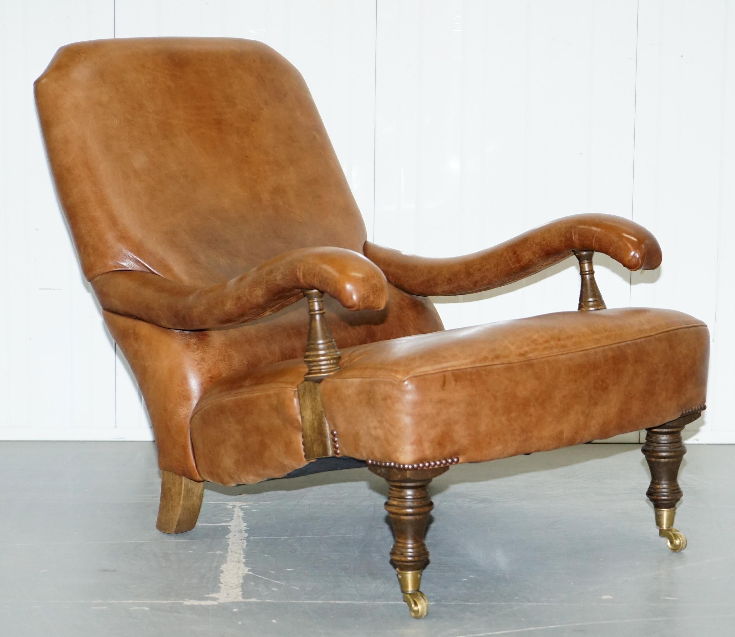 We are delighted to offer for sale this stunning original John Sankey Byron hand dyed brown leather library slipper armchair with matching ottoman 

These were placed in a study and never used, they look retail new to my eyes and hands, they may