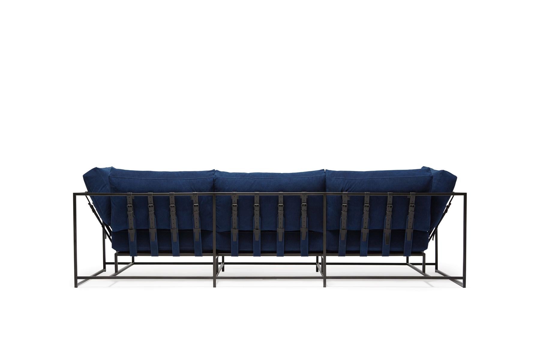 The Inheritance Sofa by Stephen Kenn is as comfortable as it is unique. The design features an exposed construction composed of three elements - a steel frame, plush upholstery, and supportive belts. The deep seating area is perfect for a relaxing