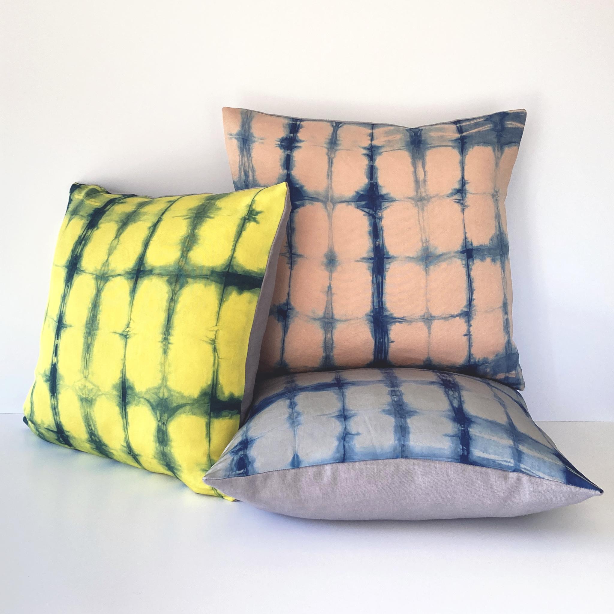 Canary yellow silk faille pillow dyed with indigo in Grid pattern with gray linen backing. Hand-dyed and sewn in New York City, down pillow insert made locally in NYC. Pillow measures 18 x 18 inches. Each silk pillow is hand made and one of a