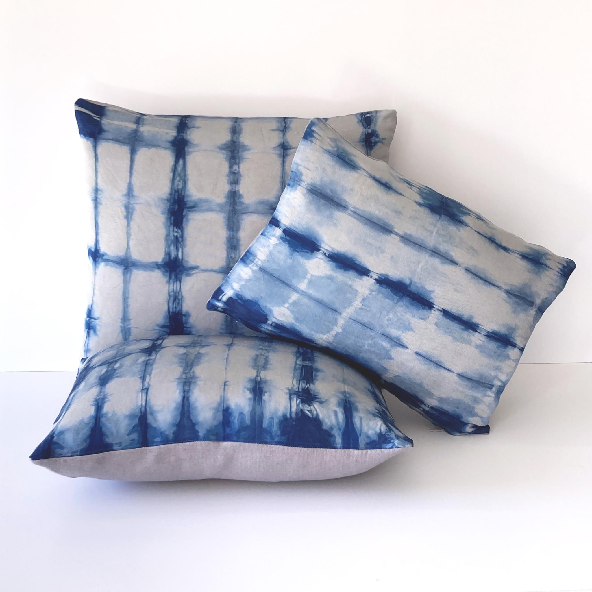 Silver gray silk faille pillow dyed with indigo in Dash pattern with gray linen backing. Hand-dyed and sewn in New York City, down pillow insert made locally in NYC. Pillow measures 12 x 16 inches. Each silk pillow is hand made and one of a