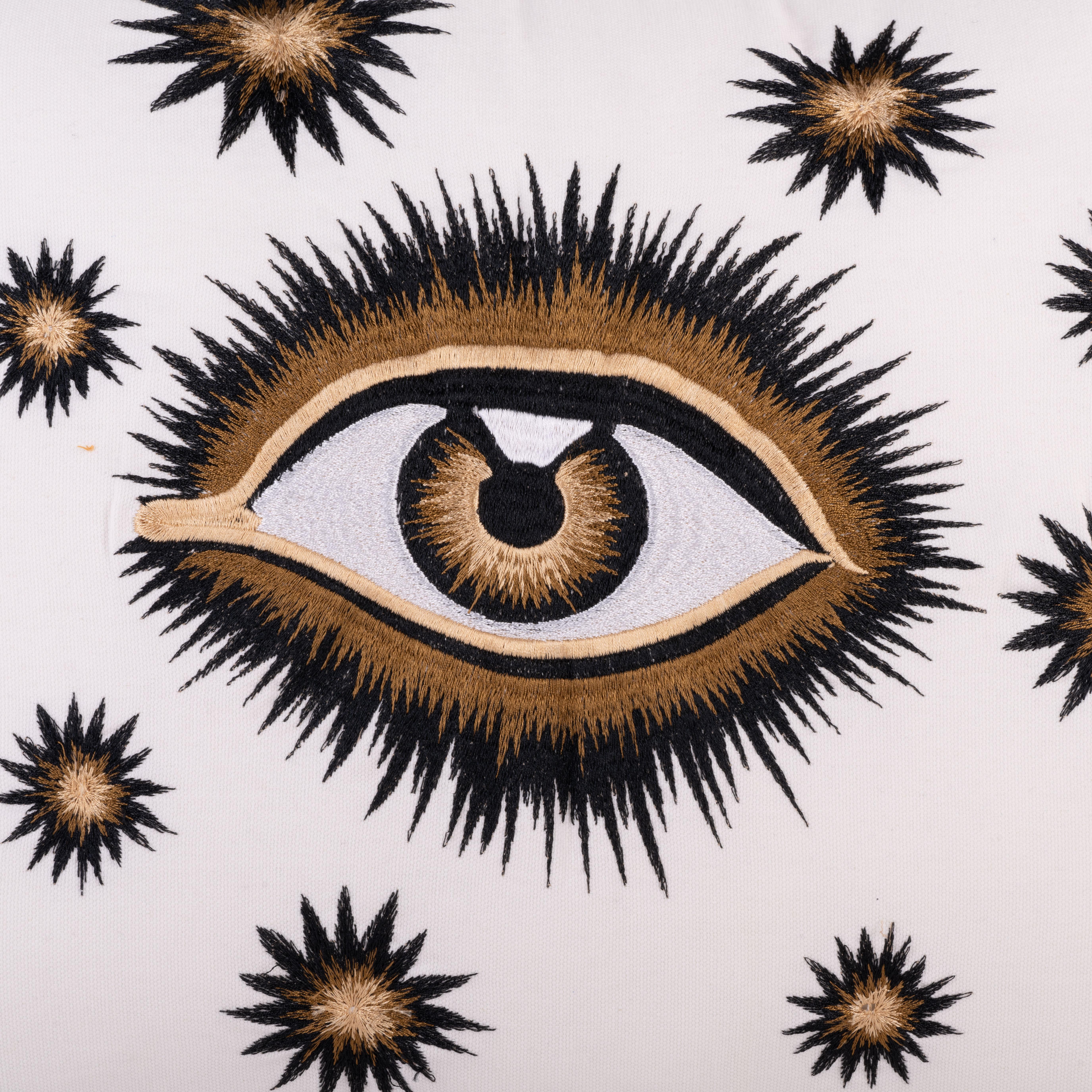Add intrigue and personality to your space with our cotton cushion featuring a beautifully hand-embroidered eye design. Perfect for layering on a sofa or bed, this is an eye-catching accent piece for any decor.