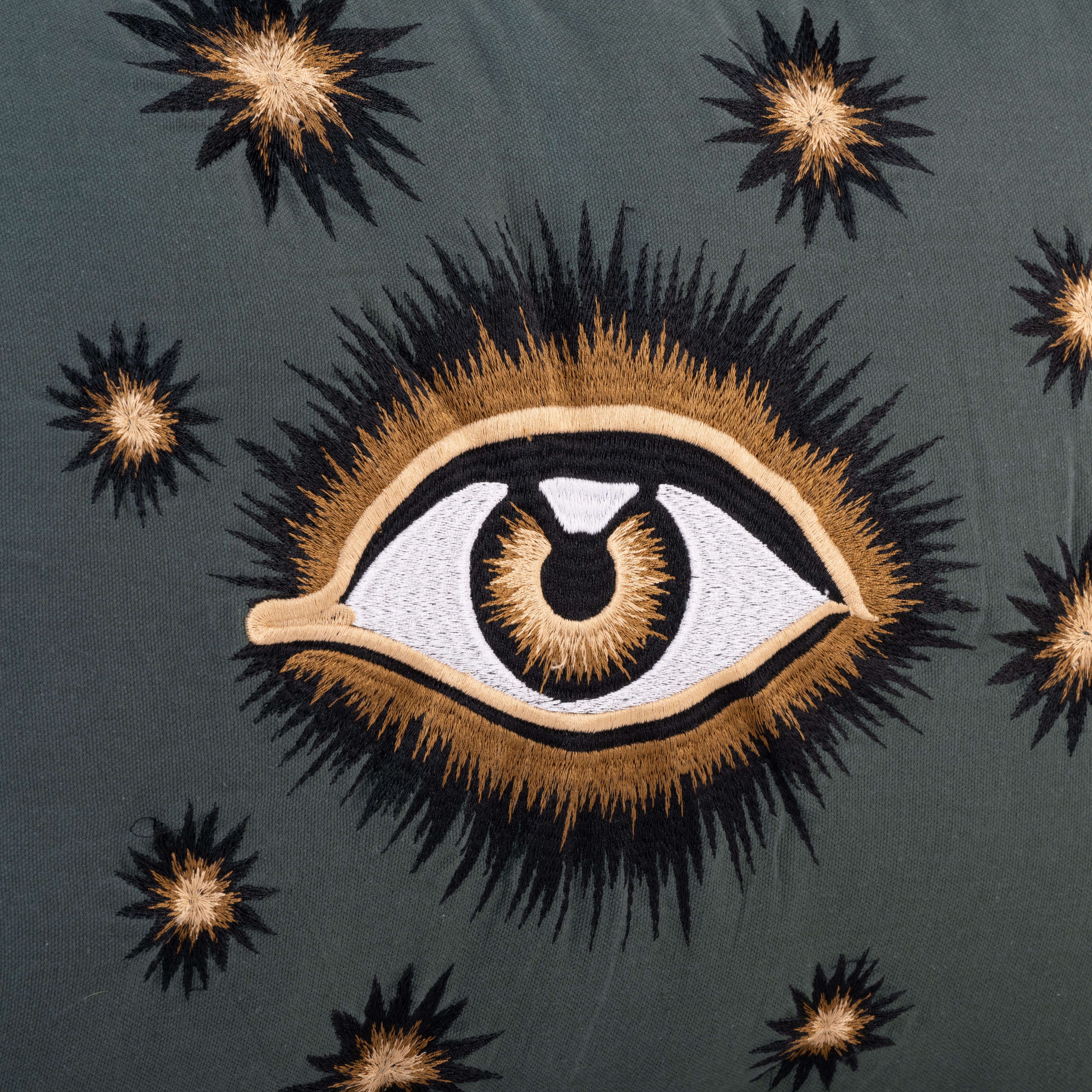 Add intrigue and personality to your space with our cotton cushion featuring a beautifully hand-embroidered eye design. Perfect for layering on a sofa or bed, this is an eye-catching accent piece for any decor.
