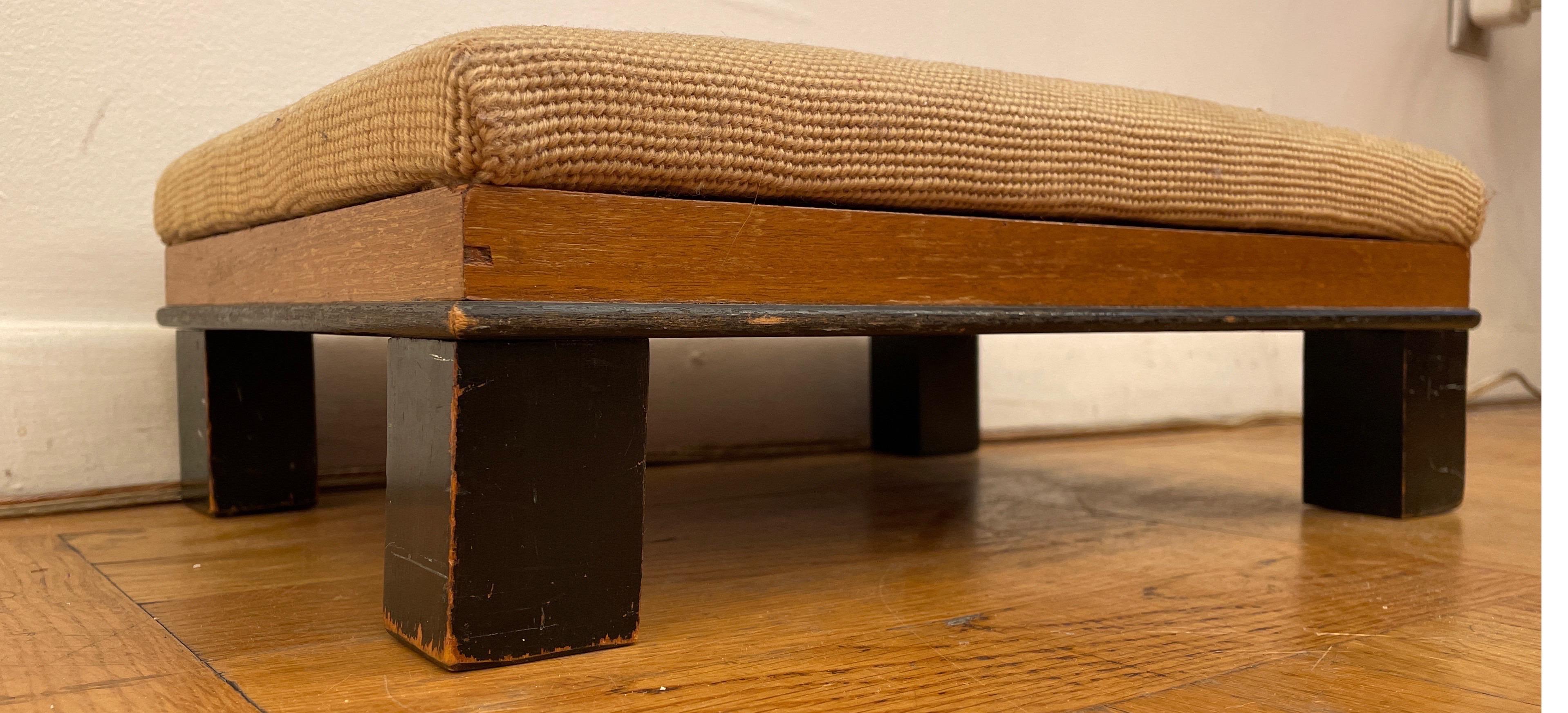 This beautiful footstool is in great condition with the original hand embrodiery still in excellent shape. Footstools have evolved throughout history starting in ancient Egypt, where it was utilized to ascend chairs perched high off the ground. It