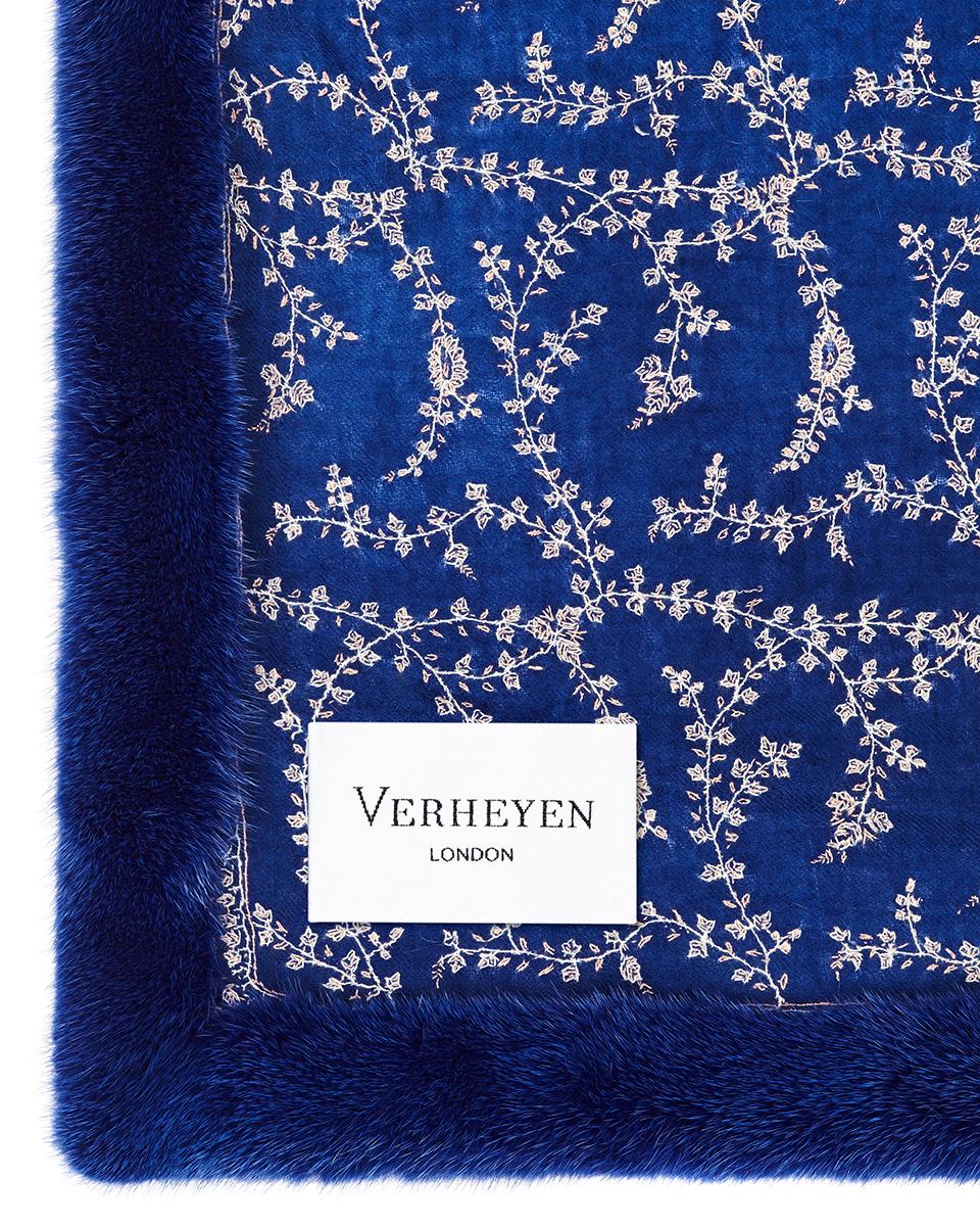Hand Embroidered Sapphire Blue Shawl & Blue Mink Fur 

Verheyen London’s shawl is spun from the finest embroidered woven cashmere mix blend from Kashmir and finished with the most exquisite dyed mink. Its warmth envelopes you with luxury, perfect
