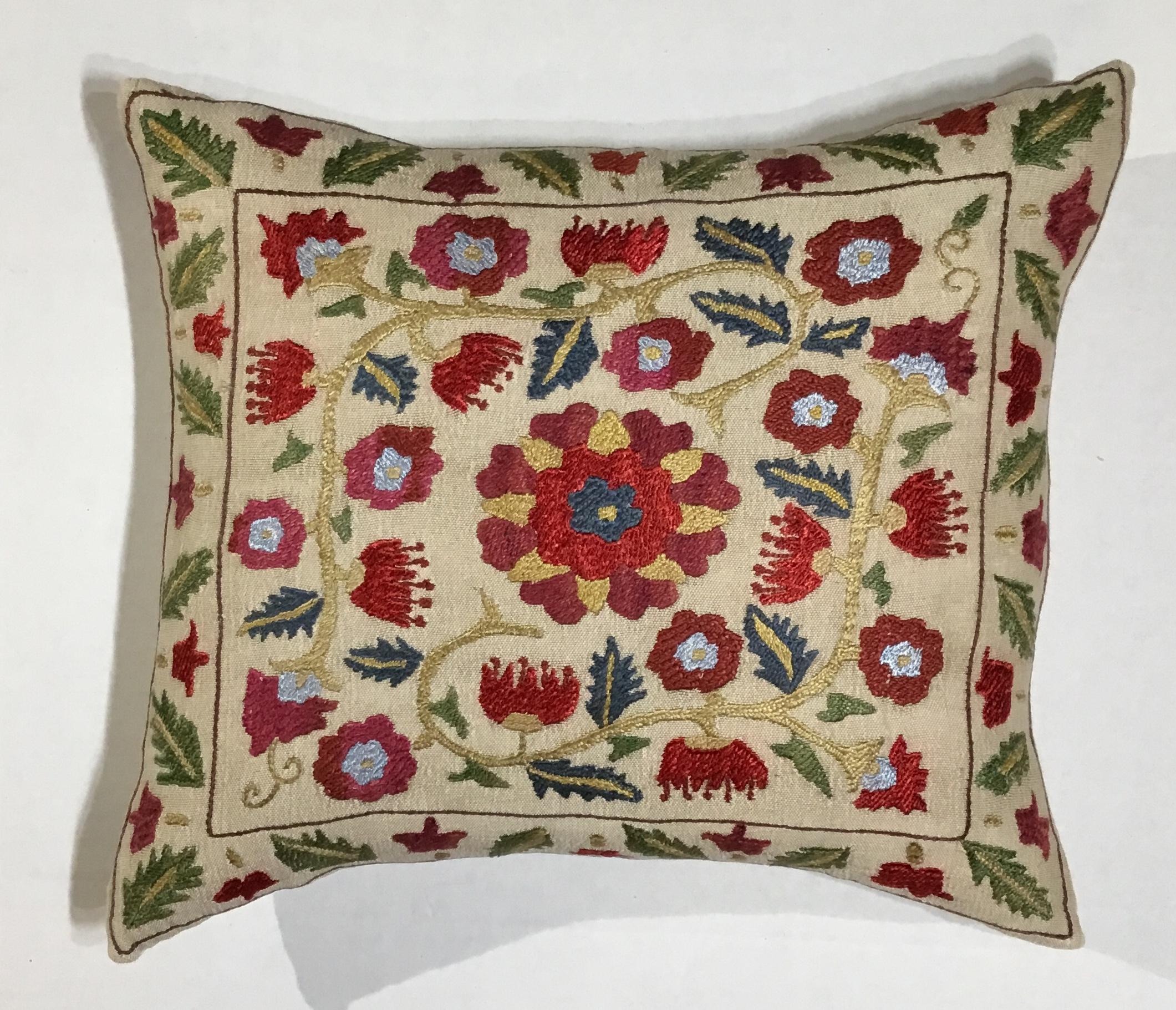 Beautiful pillow made of hand embroidery silk on cream color cotton background. Flowers and vine motifs all around, cotton backing with zipper, fresh new insert.