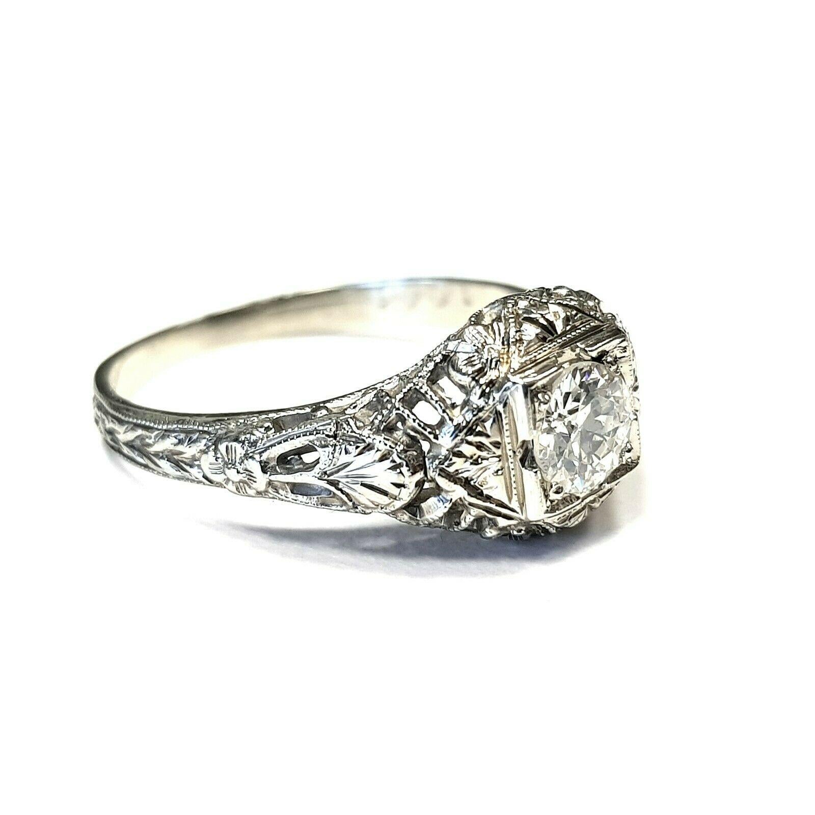  This is an antique 18k white gold ring with G/SI1 round diamond. The current ring size is 6US, but it can be resized to fit any finger. 
Specifications:
    main stone: DIAMOND
    carat total weight: 0.50
    color: G
    clarity: SI1
    brand: