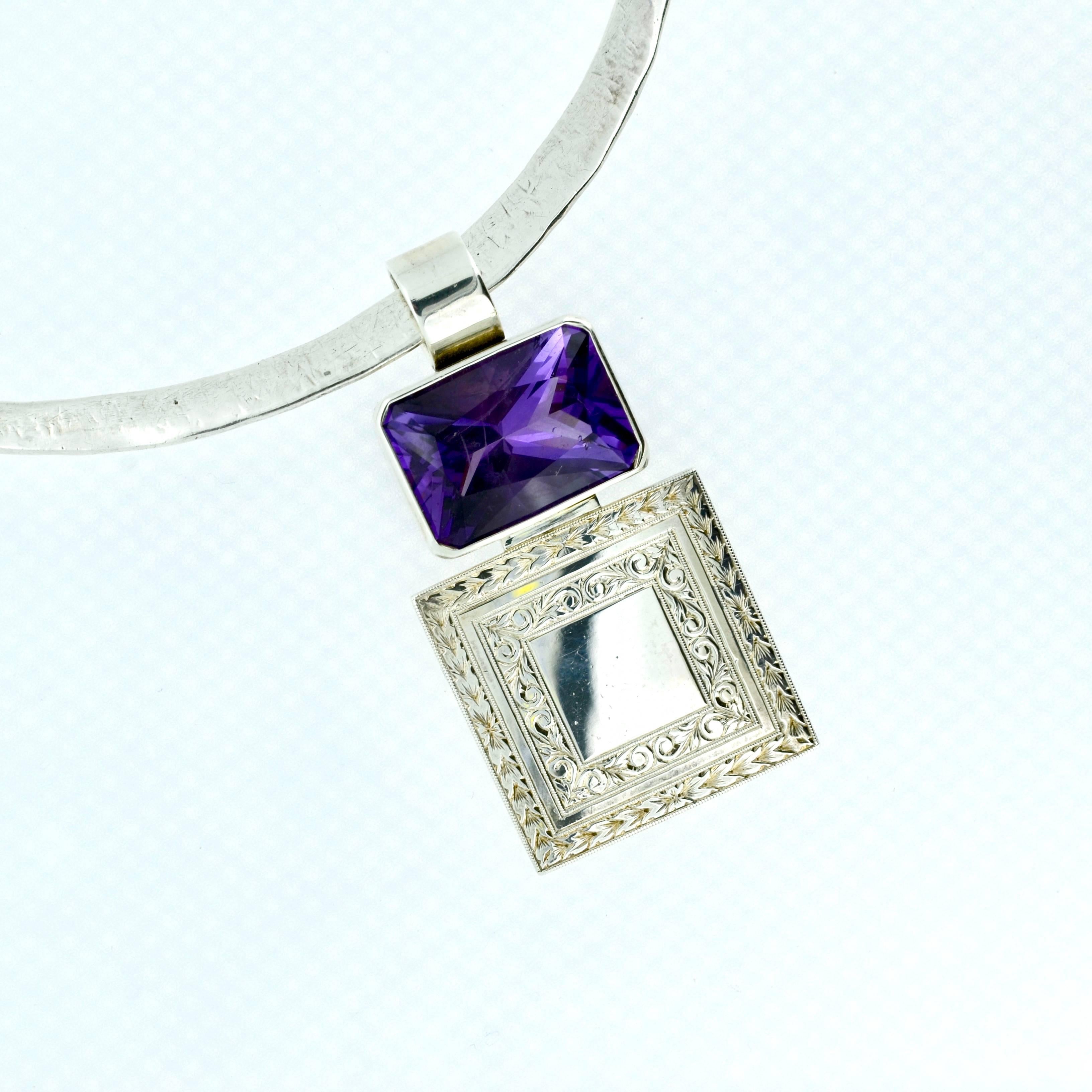 Hand fabricated one of a kind hand engraved sterling silver neck piece. Collar is hand hammered and sculpted approximately 16 inches. Neckpiece is hand engraved one inch square. Beautiful faceted 18mmX16mm Amethyst is bezel set with 6.5mm heavy