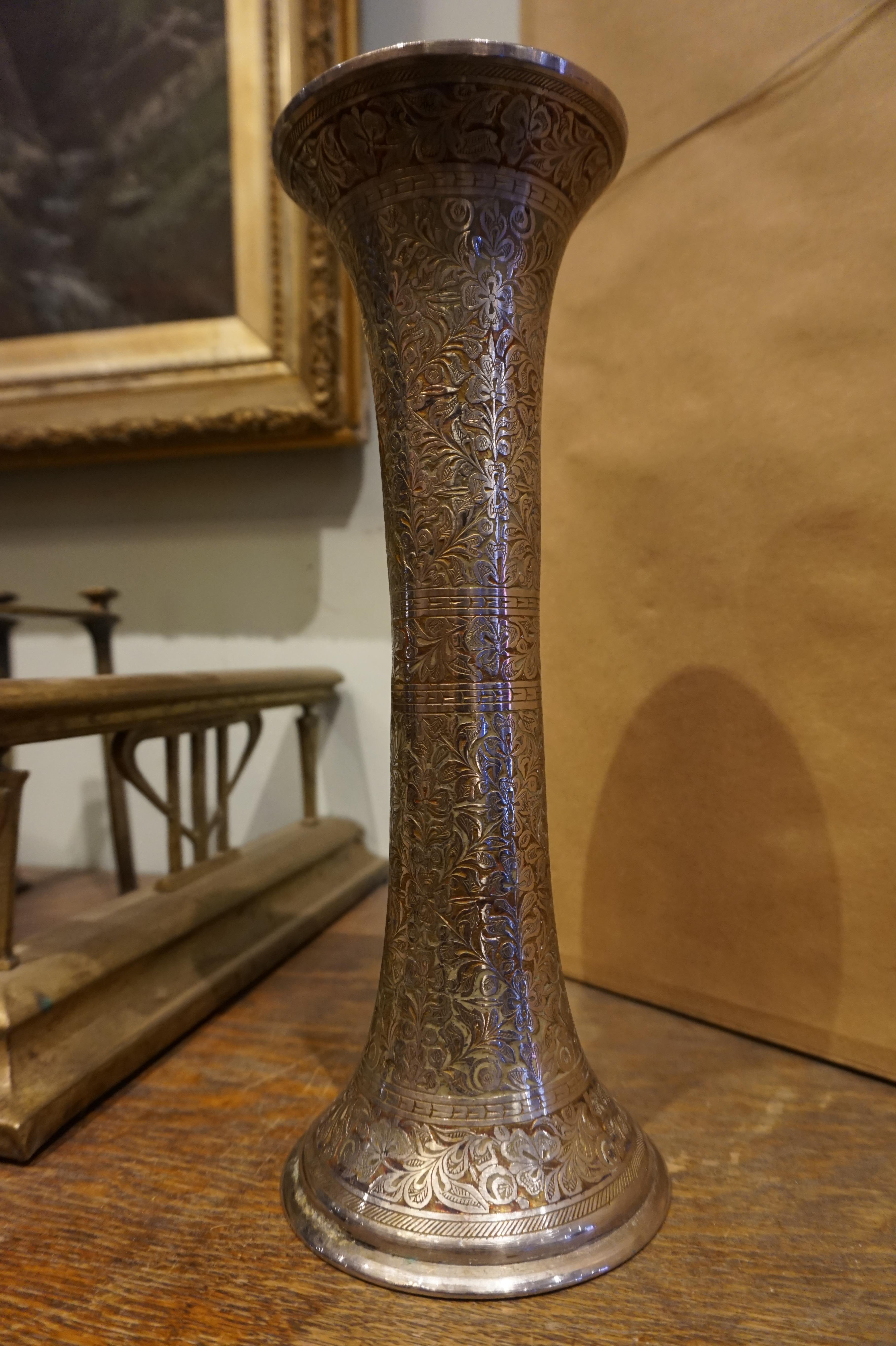 Very fine hand engraved and painted silver plated British India export vase with excellent floral detail. Cylindrical hour glass shape is unique. One foot height. High quality piece.