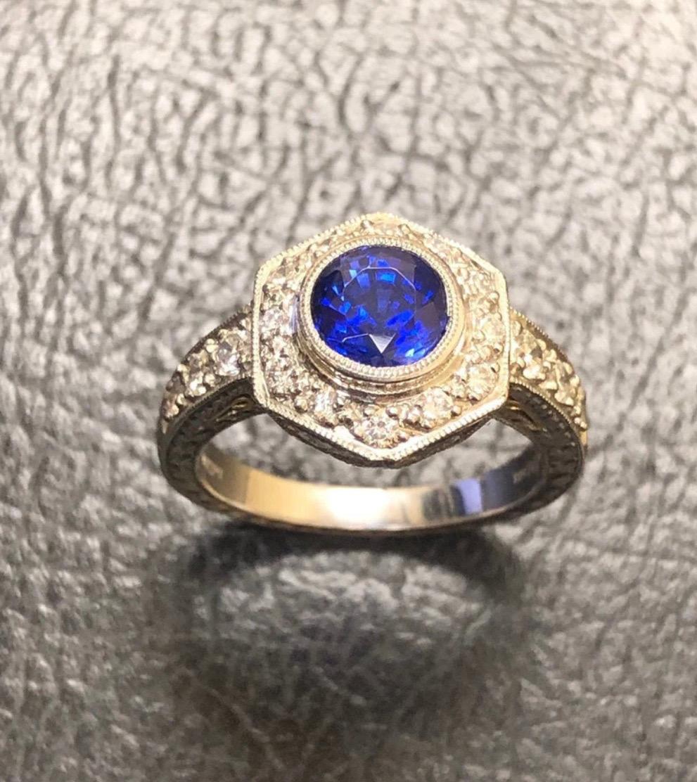 DeKara Designs Collection

Metal- 90% Platinum, 10% Iridium, 18K Yellow Gold Wire.

Stones- 1 Round Ceylon Blue Sapphire 2.07 Carats, 18 Round Diamonds G Color VS1 Clarity, 0.52 Carats.

Size 7 Available to Ship Out Today!

Beautiful Art Deco