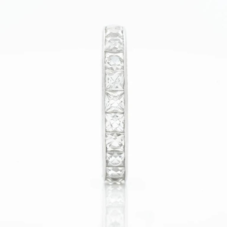 Modern Hand Engraved Platinum and 4.0 Carat French Cut Diamond Eternity Ring For Sale