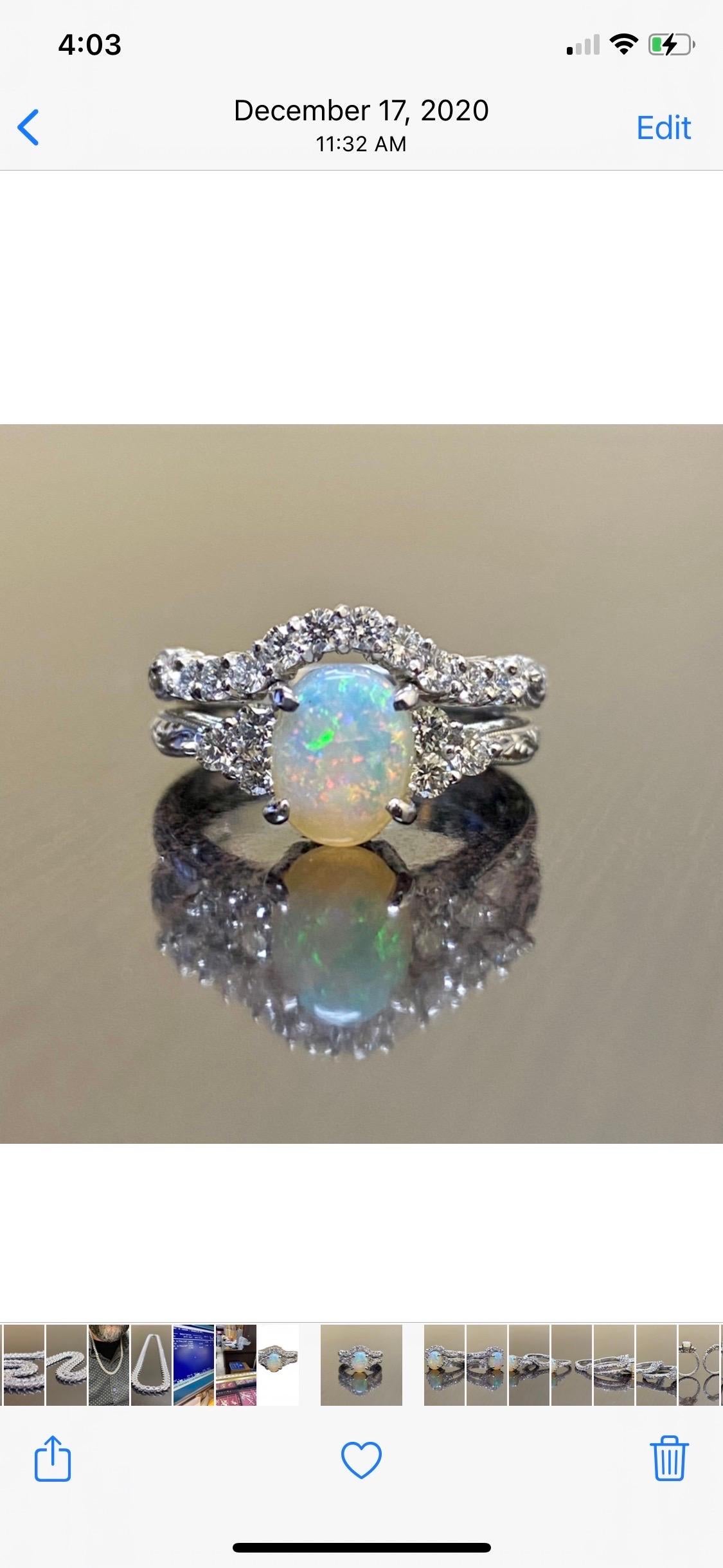 DeKara Designs Collection

Our latest design! An elegant and lustrous Opal cabochon and diamond platinum engagement ring with matching band.

Metal- 18K White Gold, .750.

Stones- Engagement Ring Center Genuine Australian Oval Opal 8 x 6 MM, 6 Round