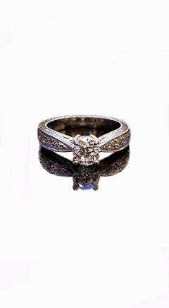 Hand Engraved Platinum GIA Certified Round F Color Diamond Engagement Ring