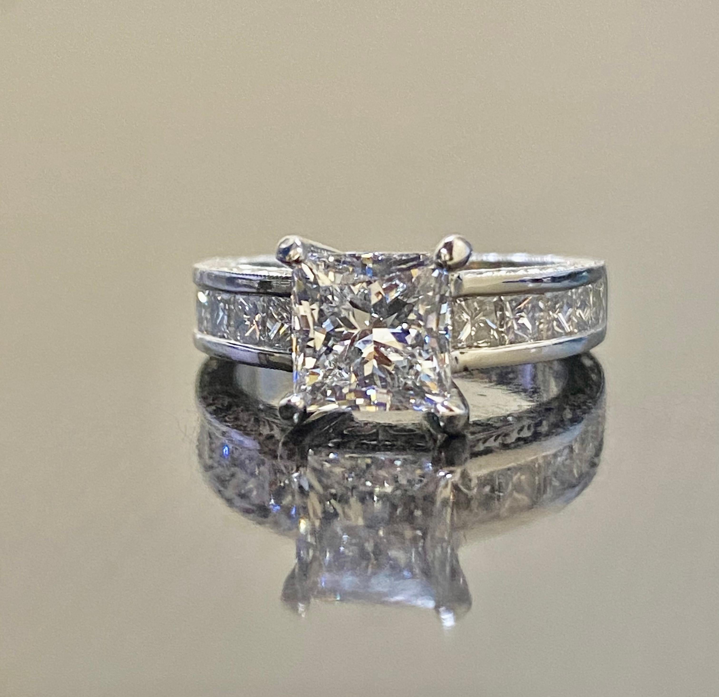 2 carat princess cut diamond ring on finger
