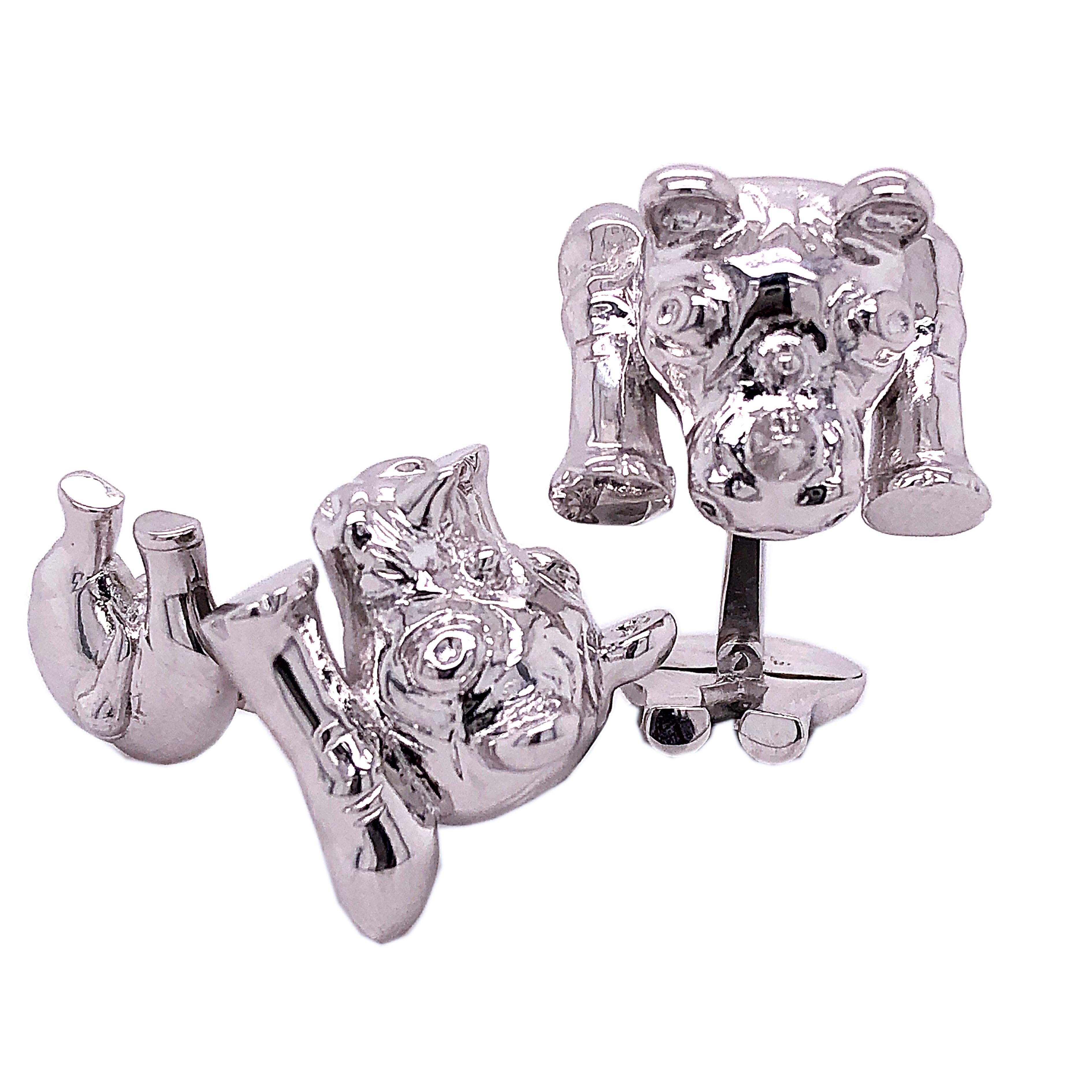 Unique, Absolutely Chic, Hand Crafted, Hand Engraved by our expert Silversmiths  Rhinoceros Shaped Solid Sterling Silver Cufflinks.

In our Smart Black Box and Pouch.
