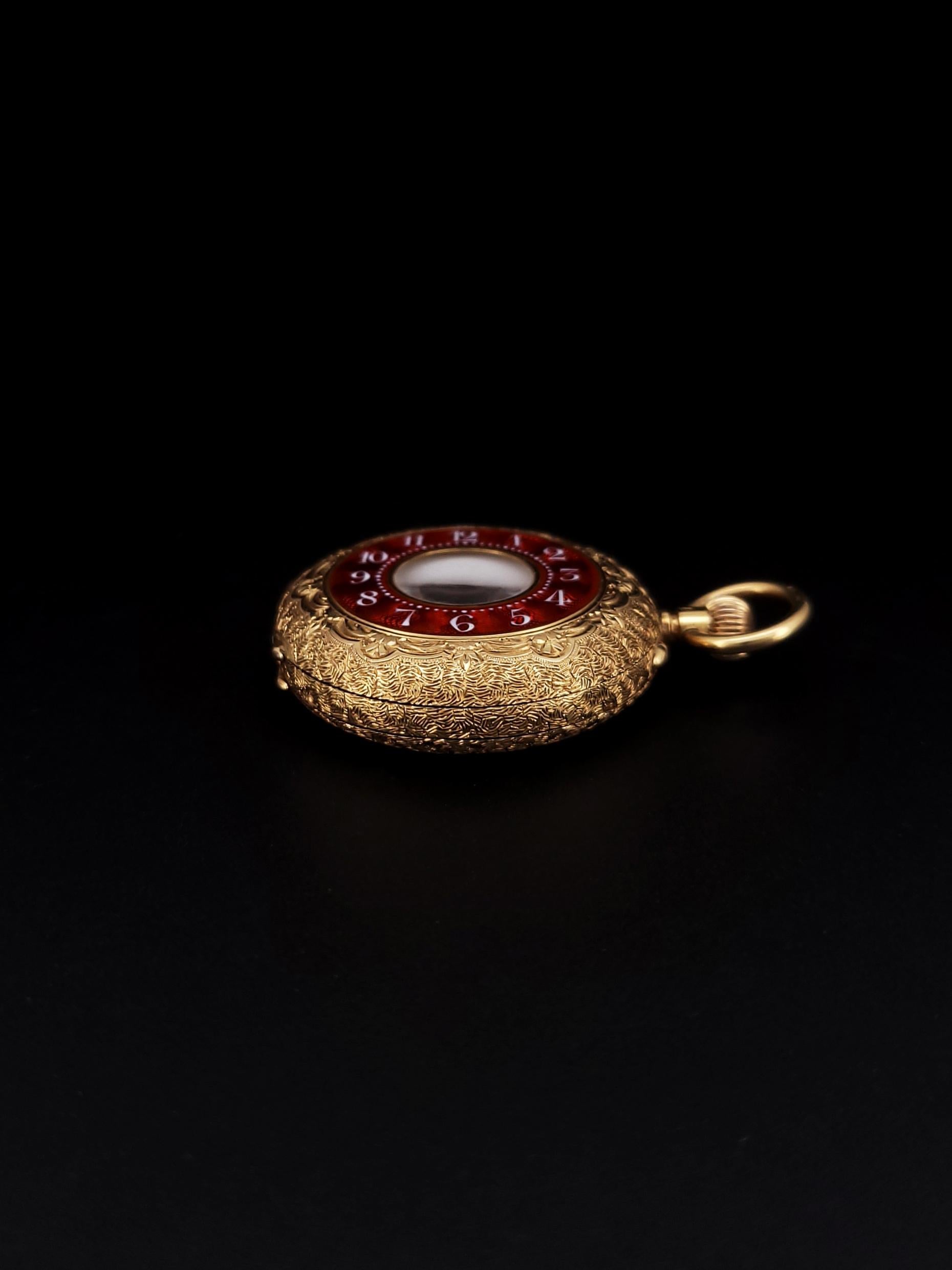 HAND ENGRAVED VINTAGE 1930S 18K YELLOW GOLD ENAMEL POCKET WATCH.
This is a vintage pocket watch in 18k yellow gold and red enamel, exclusively sold as one-of-a-kind.

Period: 1930s 
Material: 18k Yellow Gold
Movement: Manual Winding
Case Diameter: