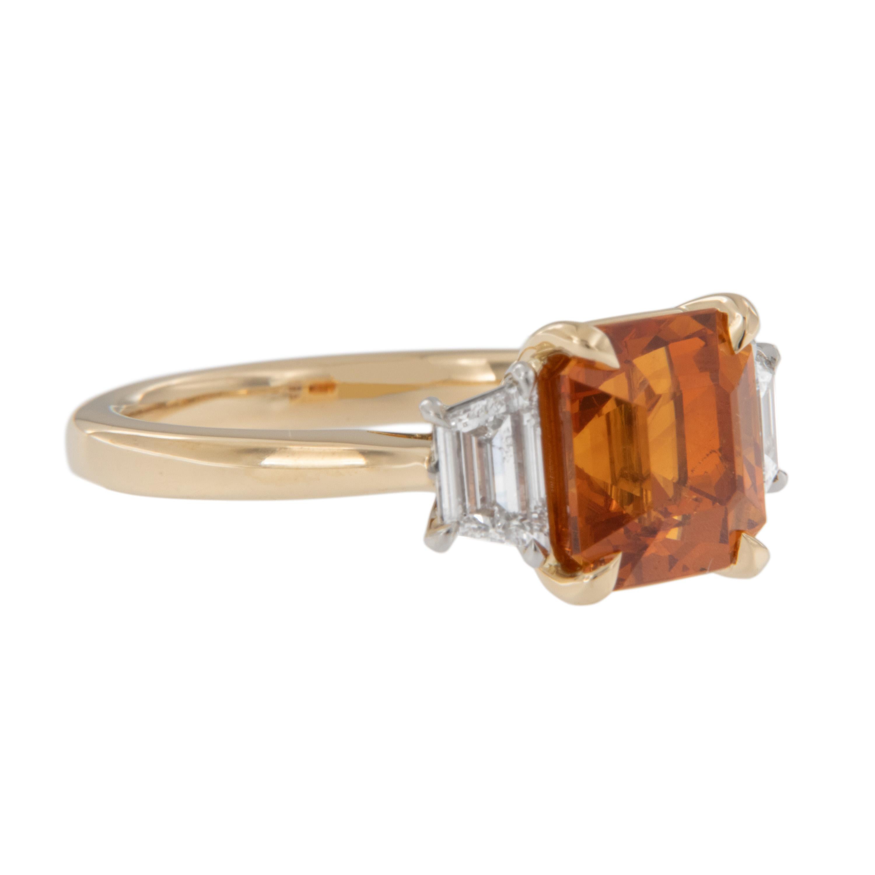 Fire hot! Exquisitely hand fabricated 18 karat yellow gold and platinum ring featuring a magnificent 4.71 Carat Mandarin Spessartine Garnet with GIA Identification Report# 6224178876. This rare gemstone is exceptional in size, color and clarity.