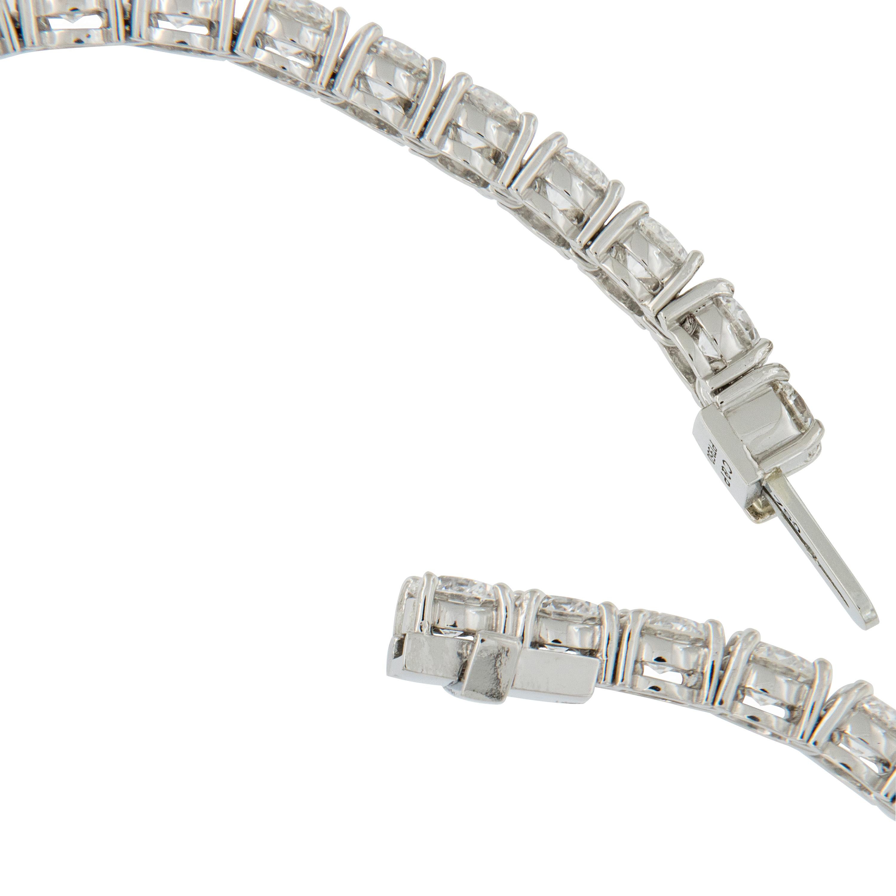Contemporary Hand Fabricated Platinum and 5.63 Cttw. Fine Quality Diamond Tennis Bracelet  For Sale