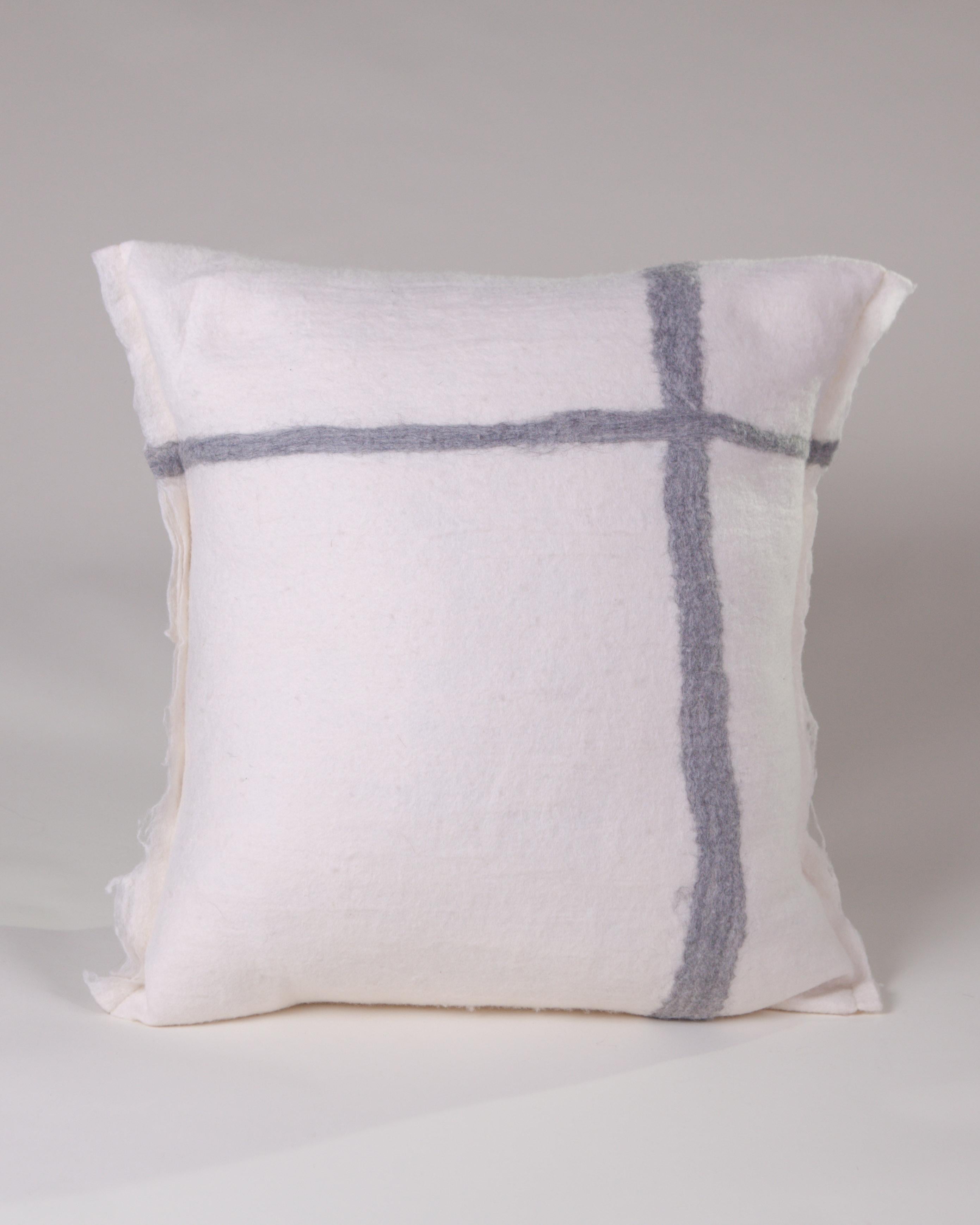 These extremely special hand felted un-dyed wool and silk cushions are created by the artist Madda Forcella in Oaxaca, Mexico. They are extremely soft to the touch and are, basically, one of a kind, due to slight variations in the fibers when