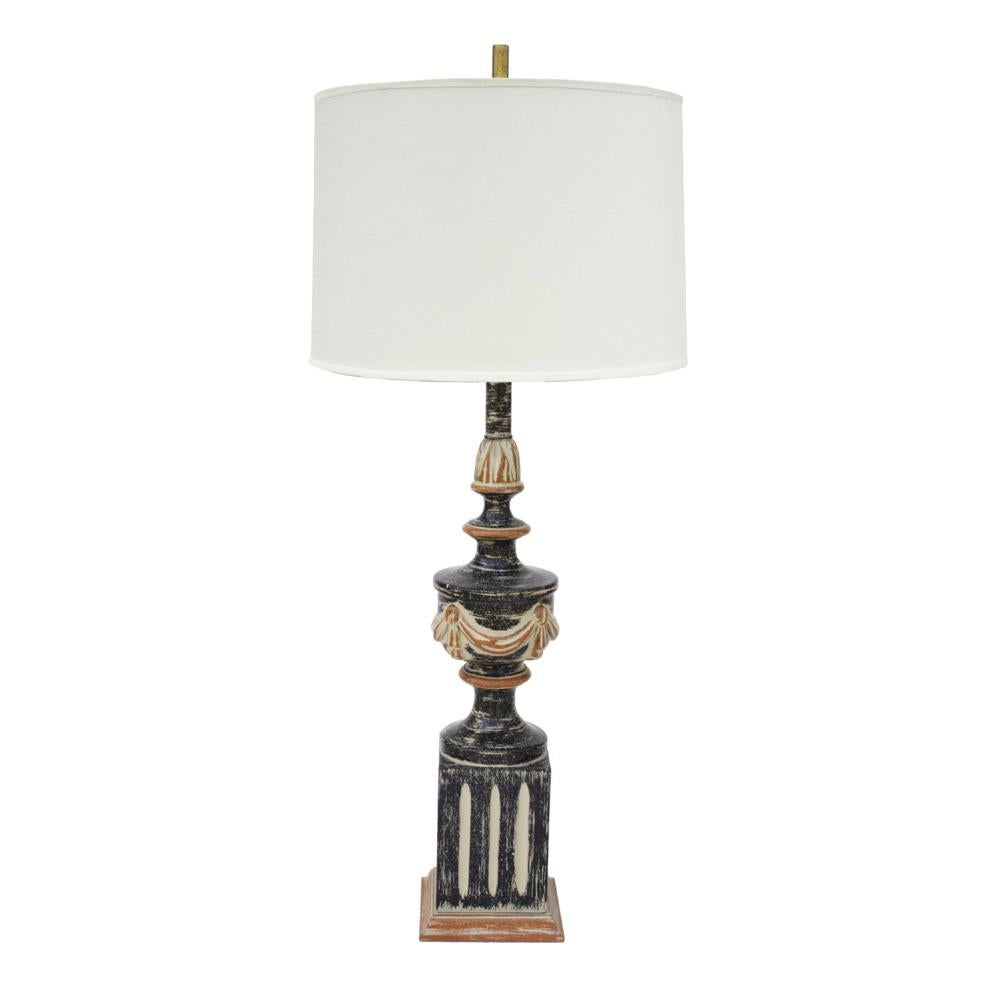 USA, 1960s
Hand Finished neoclassical table lamp in black, taupe, and burnt orange. The brush marks are fantastically exaggerated. The base is fluted and the center part has an exaggerated swag all around. The quality is excellent. It's a slim piece