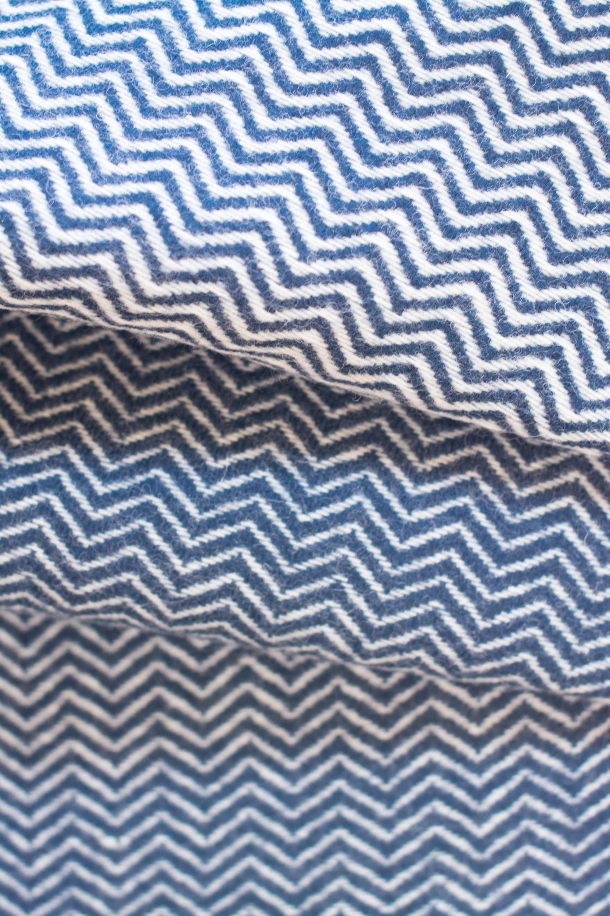 The Otilia sea green diamond pattern blanket or throw has been created by an incredible and unique family owned weaving and textile company in Portugal. This company impressed us so much by their commitment to working with the environment, their