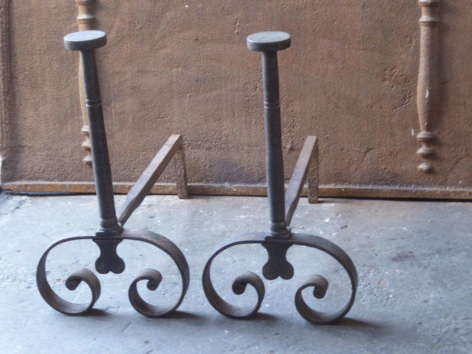 19th century French Napoleon III andirons made of hand forged wrought iron. The andirons are in a good condition.