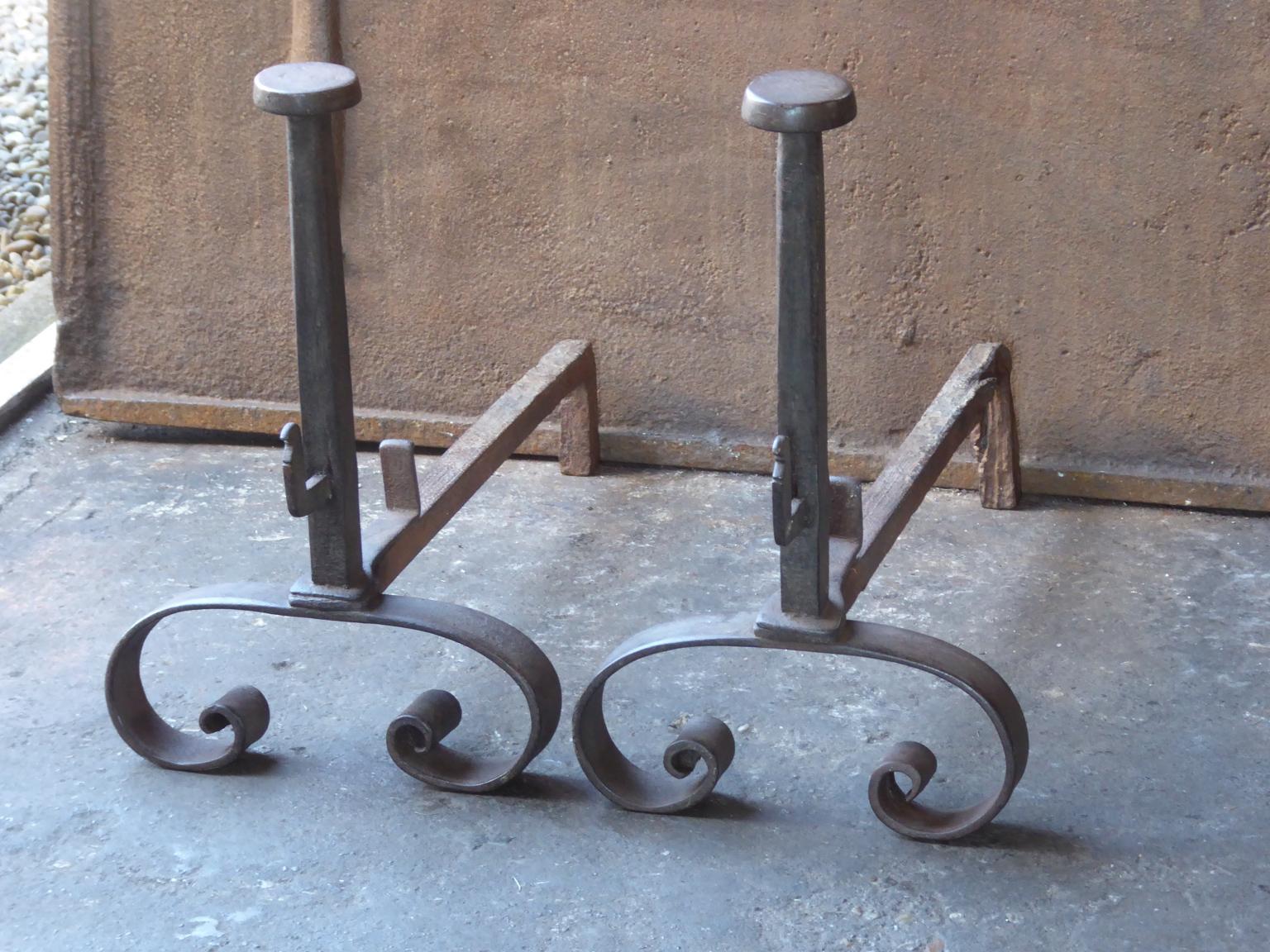 19th century French Napoleon III andirons period made of hand forged wrought iron. The andirons are in a good condition and fit for use in the fireplace.