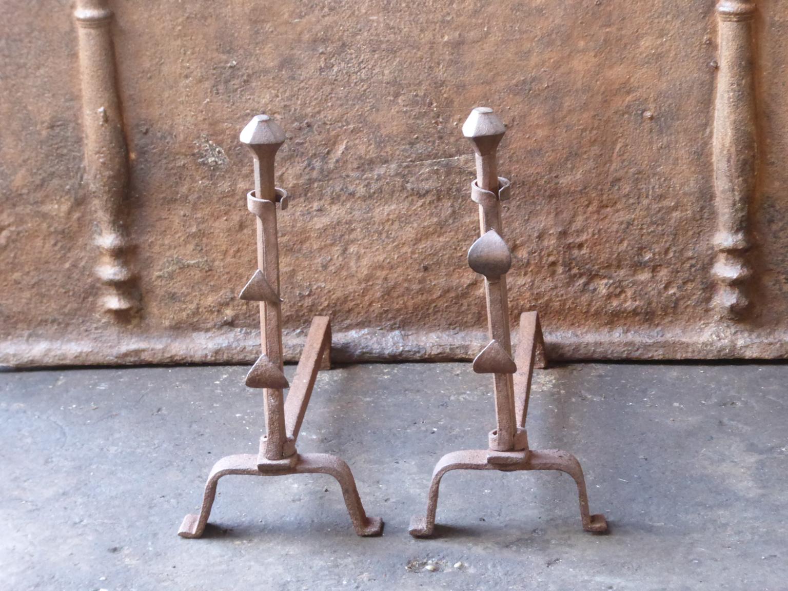 19th century French Napoleon III andirons made of hand forged wrought iron. The andirons are in a good condition and fit for use in the fireplace.