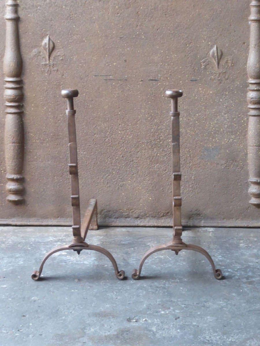 19th century French Napoleon III Period andirons made of hand forged wrought iron. The andirons are in a good condition and fit for use in the fireplace.