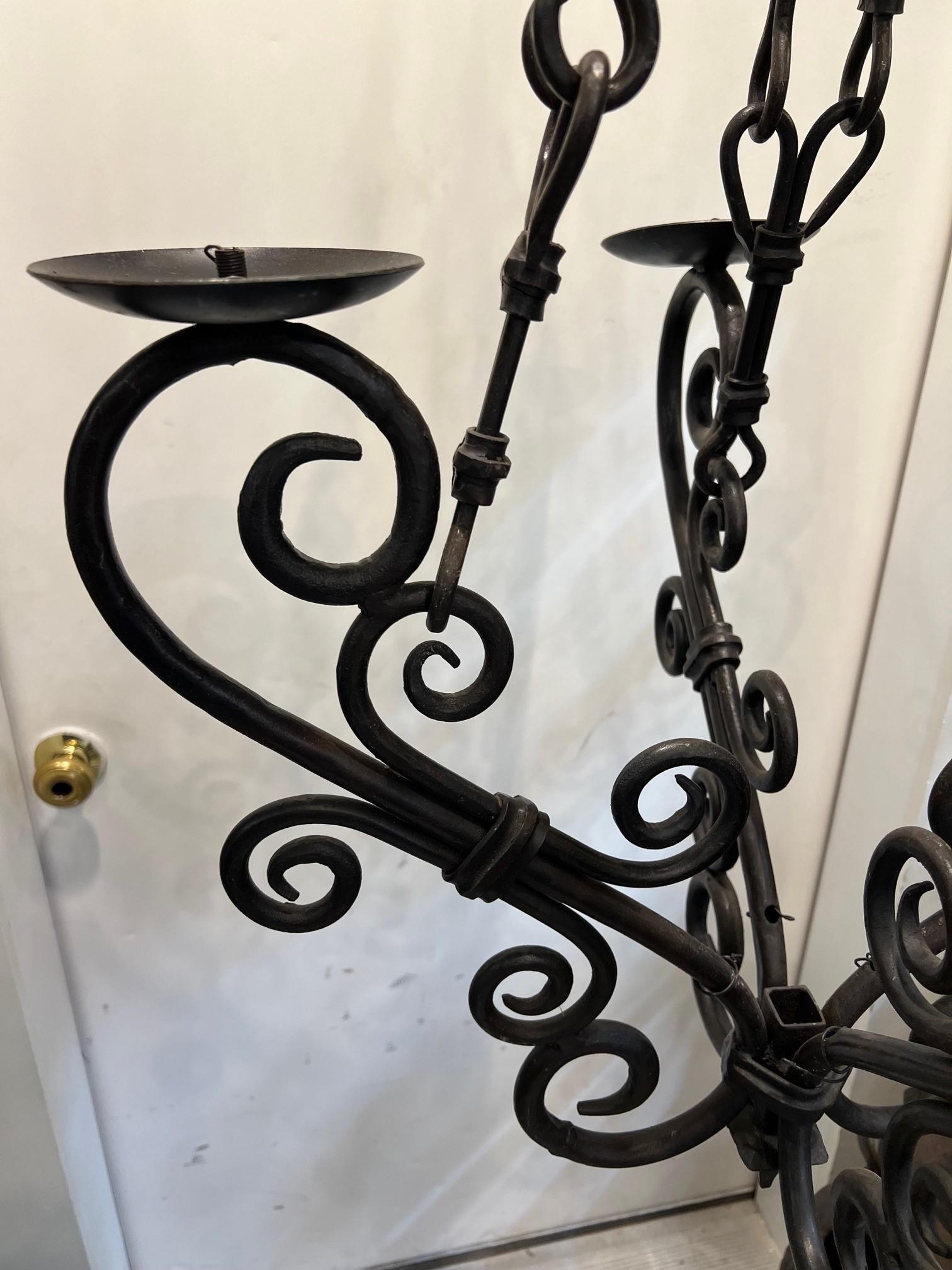 Hand Forged  Iron Chandelier 4 Lights Scrolled Arms    In Good Condition For Sale In Stamford, CT