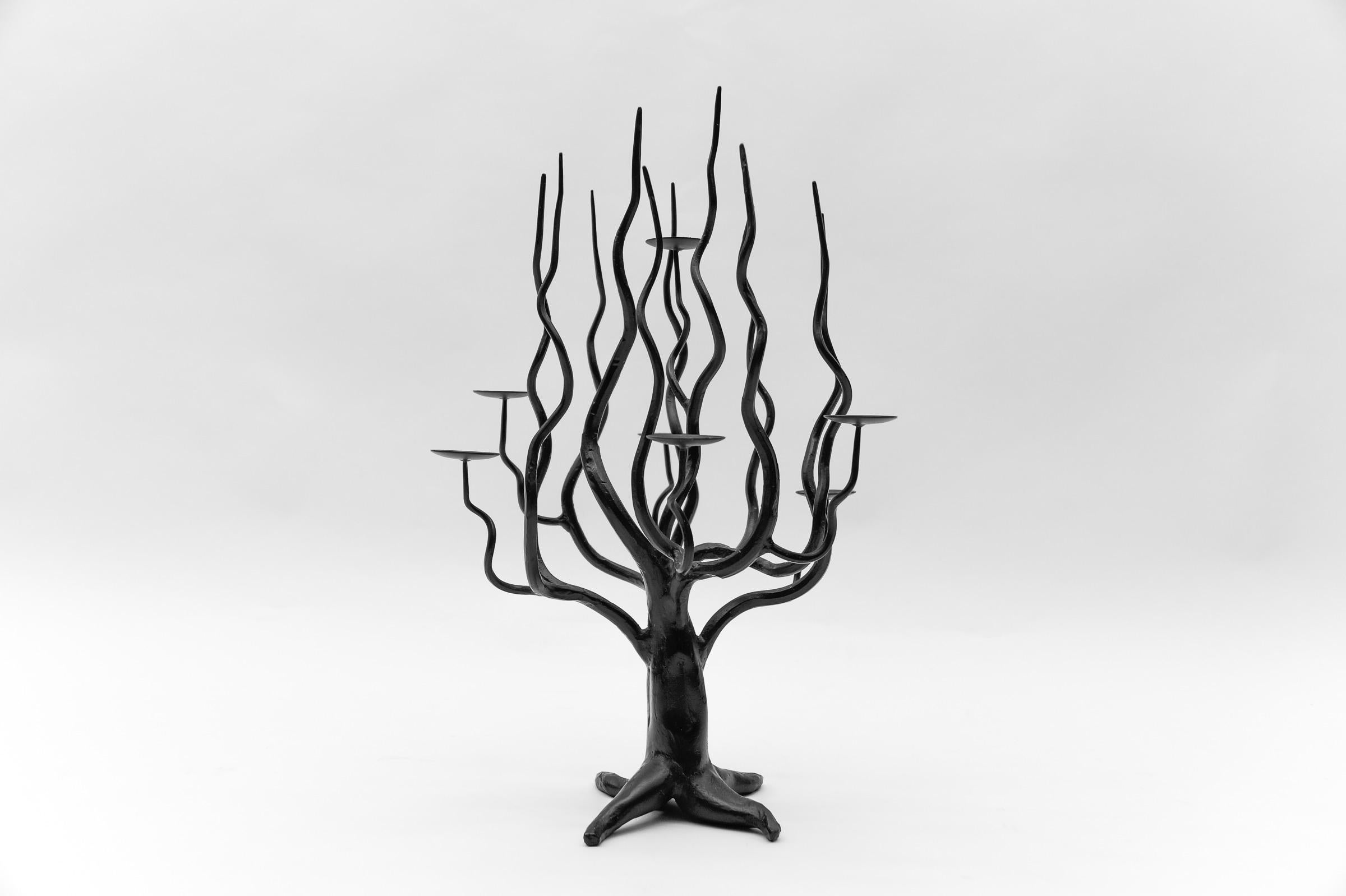 Hand-forged metal design tree of life sculpture candle holder, 1960s 

A beautifully perfectly shaped tree of life made of iron. Artful craftsmanship.

We have a matching wall candle holder from the same forge. You can find it for sale here on the
