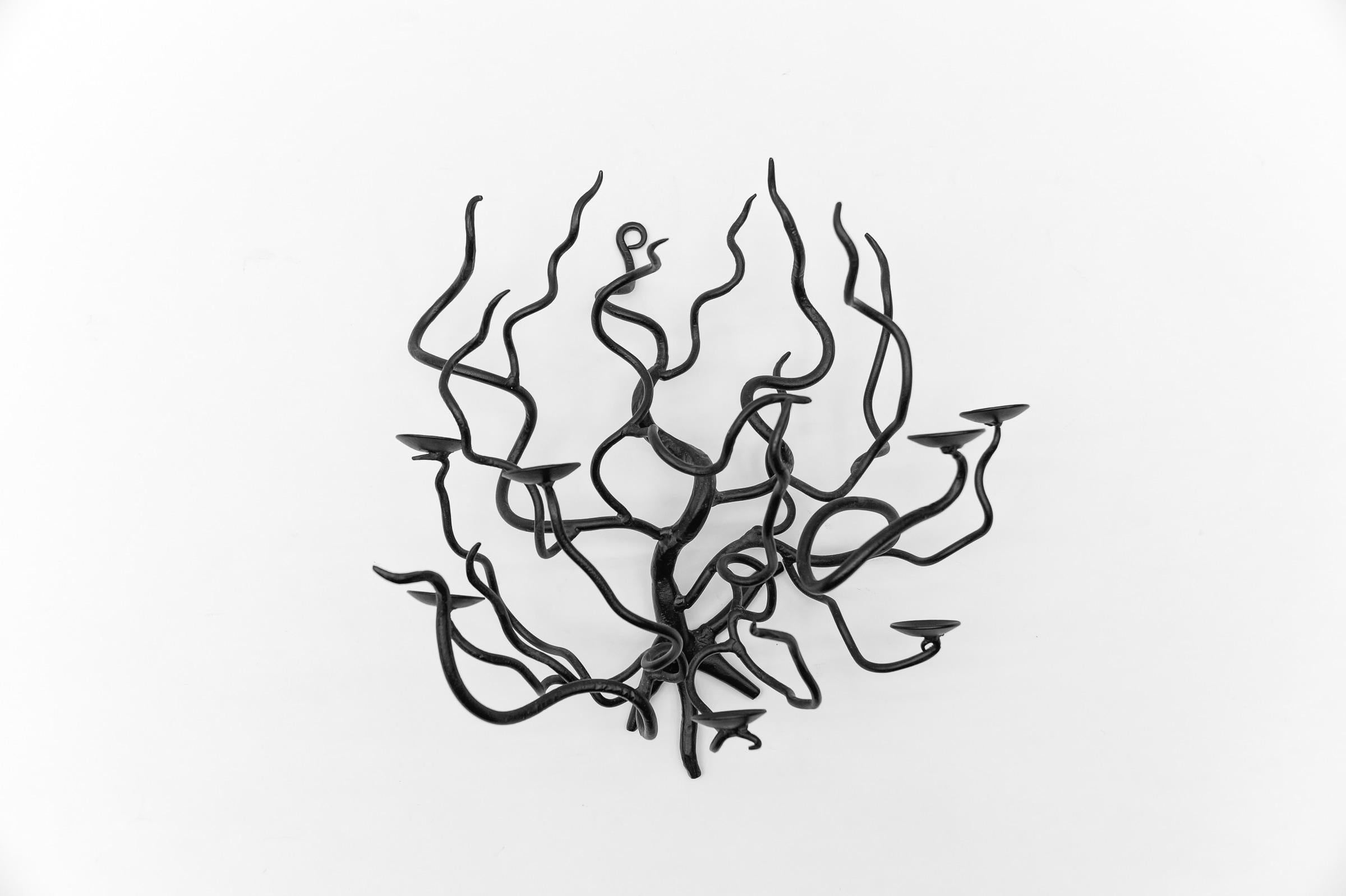 Hand-forged metal design tree of life wall sculpture candle holder, 1960s 

A beautifully perfectly shaped tree of life made of iron. Artful craftsmanship.

We have a matching candle holder from the same forge. You can find it for sale here on the