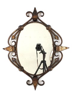 Hand Forged Oval Wall Mirror in Gilt Iron, France 1940s