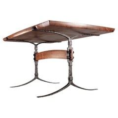 Hand-forged steel and wood trestle dining table with California walnut top