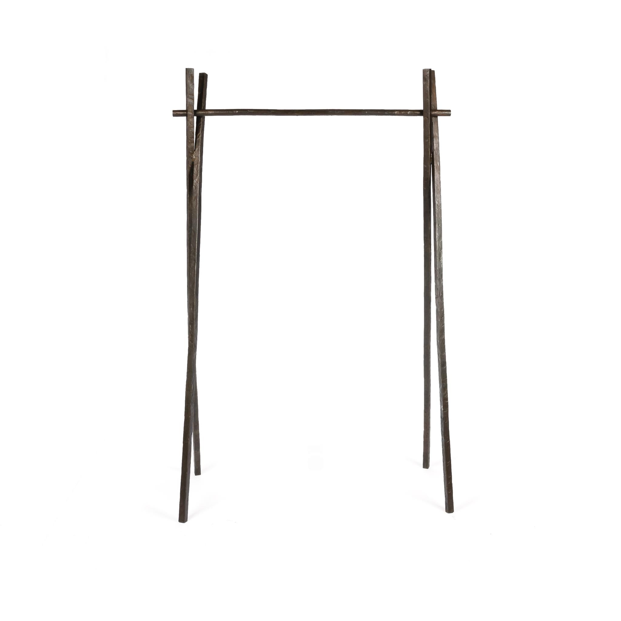 The Arbor rack is an understated hand forged clothing rack, designed by Matt Adams. Perfect for hanging and showcasing your favorite coats. The Arbor rack was originally designed for retail concepts making it ultra durable and stable. It's