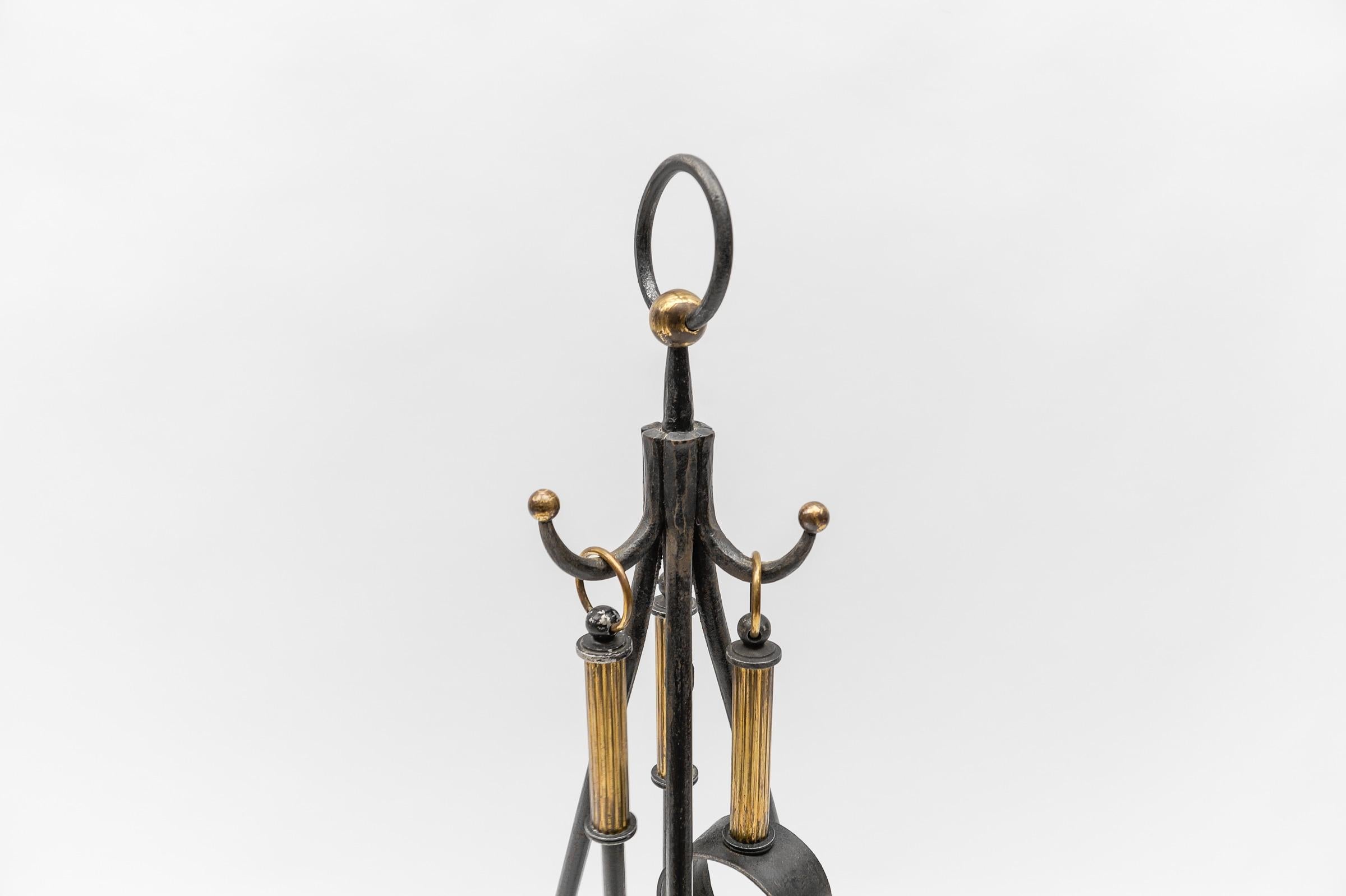 Mid-20th Century Hand Forged Tripod Iron and Brass Stand with Fireplace Tools, Austria, 1950s For Sale