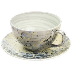 Grande tasse et soucoupe en porcelaine fine à la cendre d'os émaillée à la main avec design expressionniste