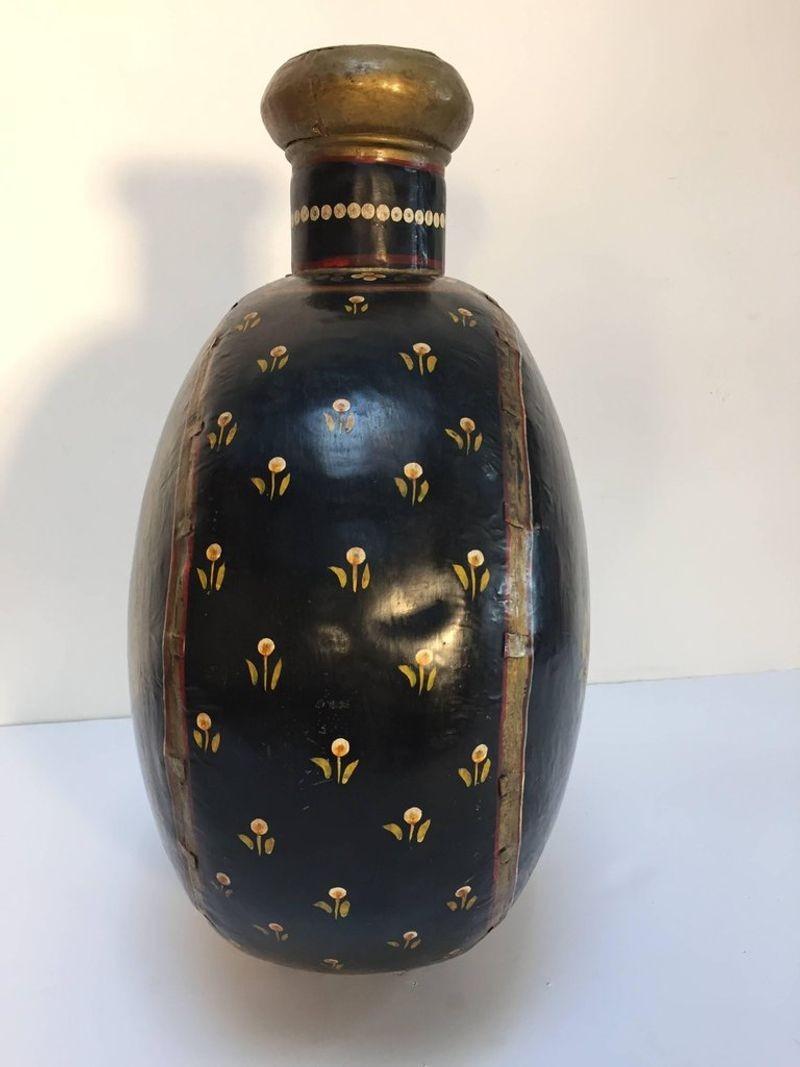 Vintage Indian Hand Painted Mughal Rajasthani Metal Water Vessel Vase.
This stunning vintage Indian water vessel is a large, hand-painted metal piece that combines the beauty of traditional Rajasthani artistry with functional design. Featuring
