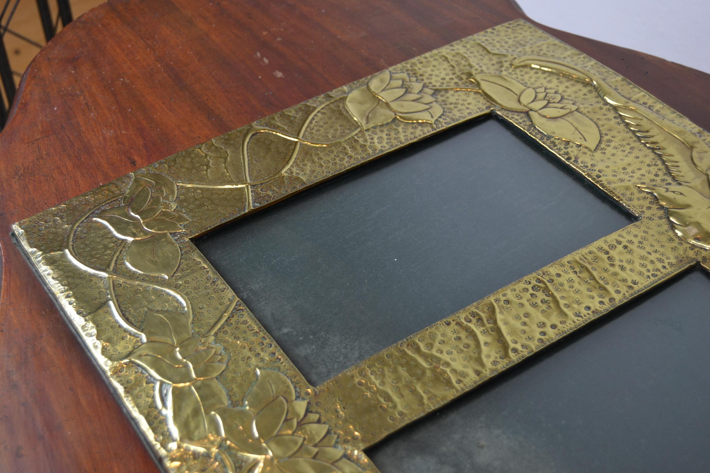 Arts and Crafts Large Brass Hammered Double Picture Frame with Bird and Flowers For Sale