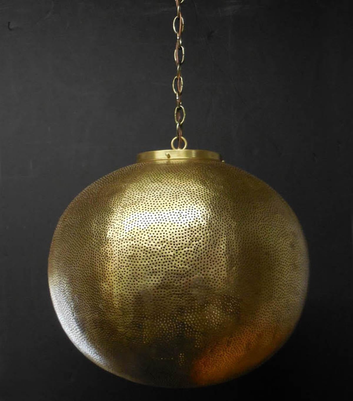 Large lantern, in hammered metal with hand finished matte bronze finish. Rewired in the US. Tiny circular cut outs. Three interior lights. Comes with chain in antique bronze finish. Ready for installation!