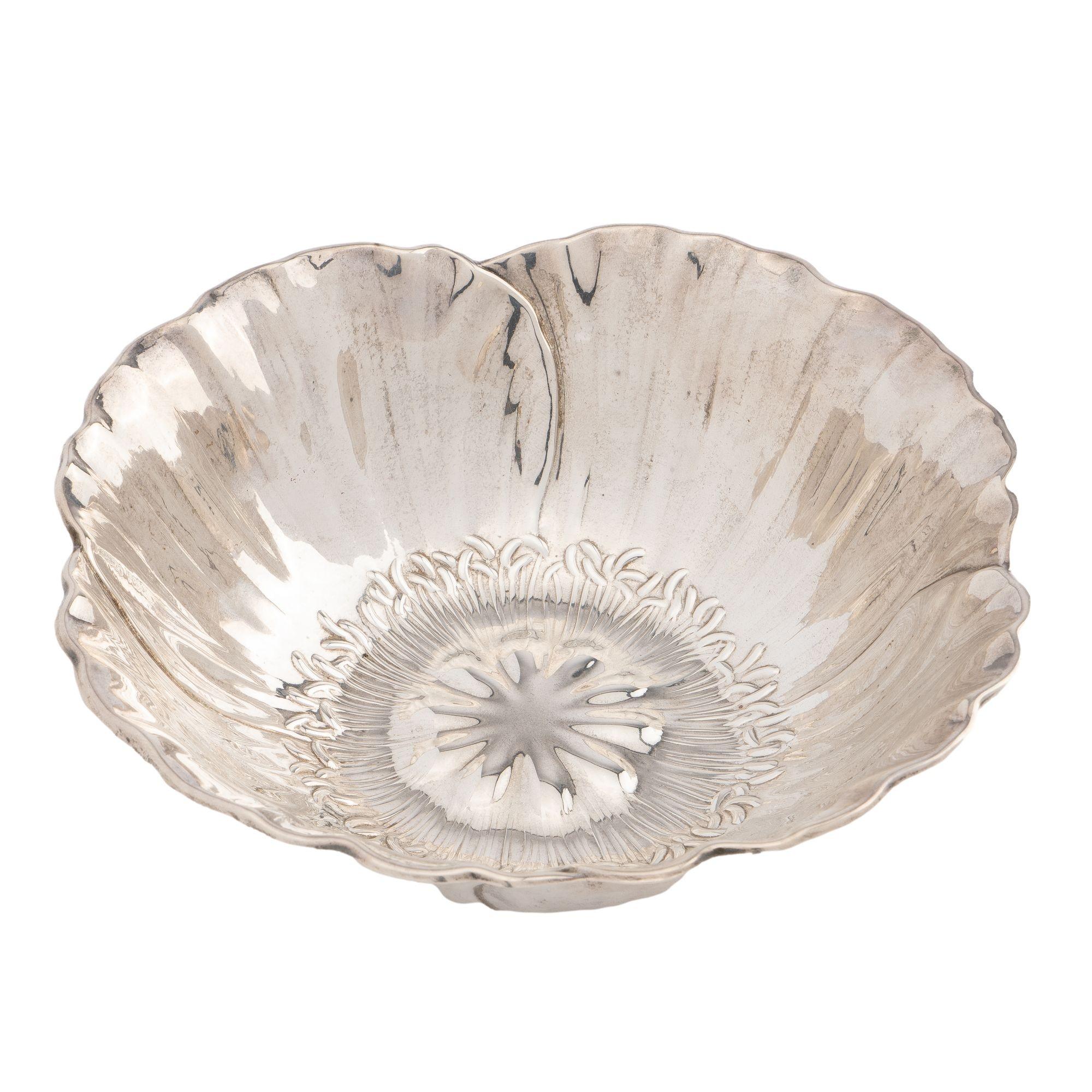 Hand hammered sterling silver poppy motif bowl in the Aesthetic taste by the Meriden Britannia Co.
Meriden, Connecticut, after 1893.