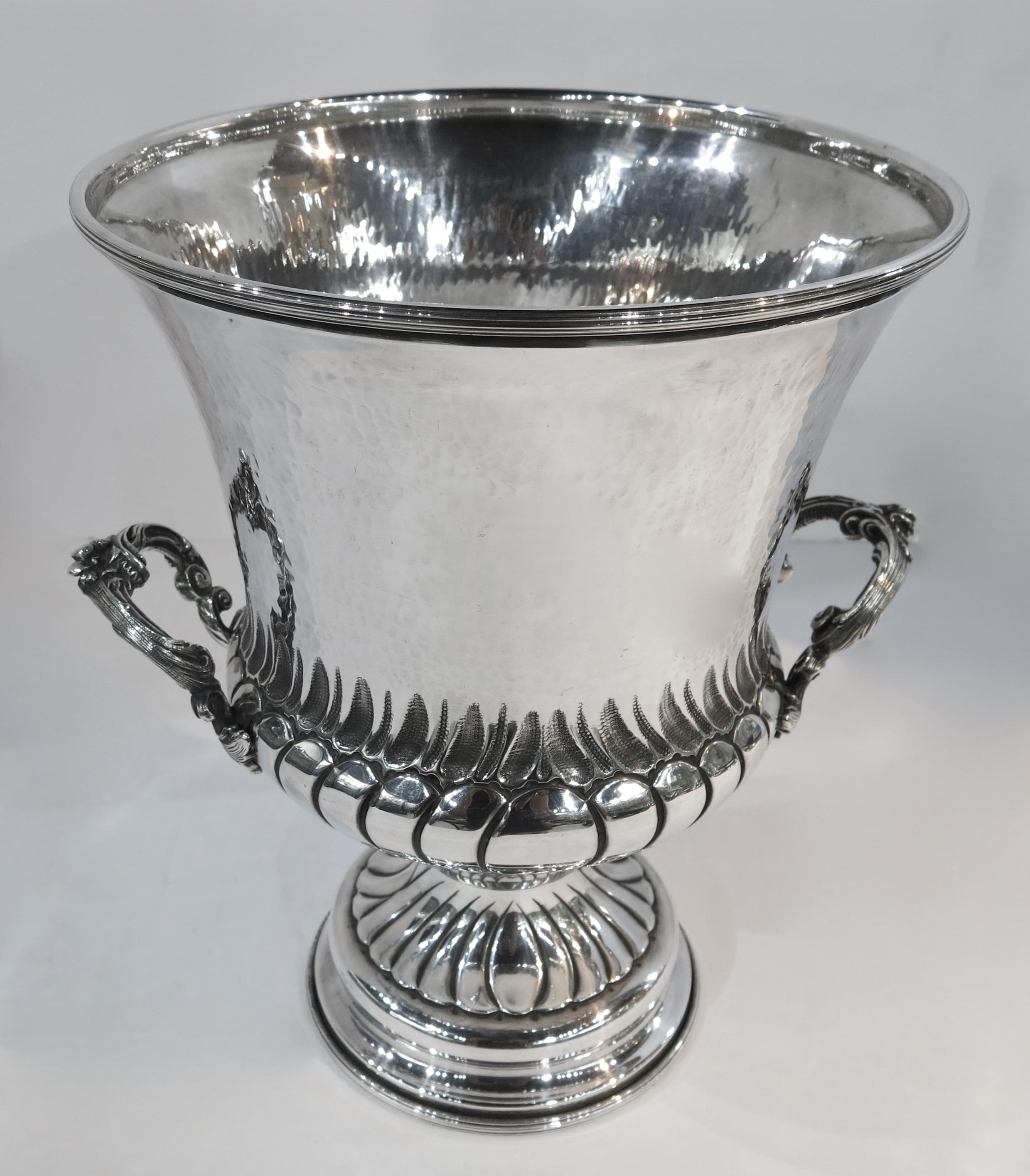 Italian, sterling silver, hand-hammered wine or champagne cooler / ice bucket.
Measures: 11.50
