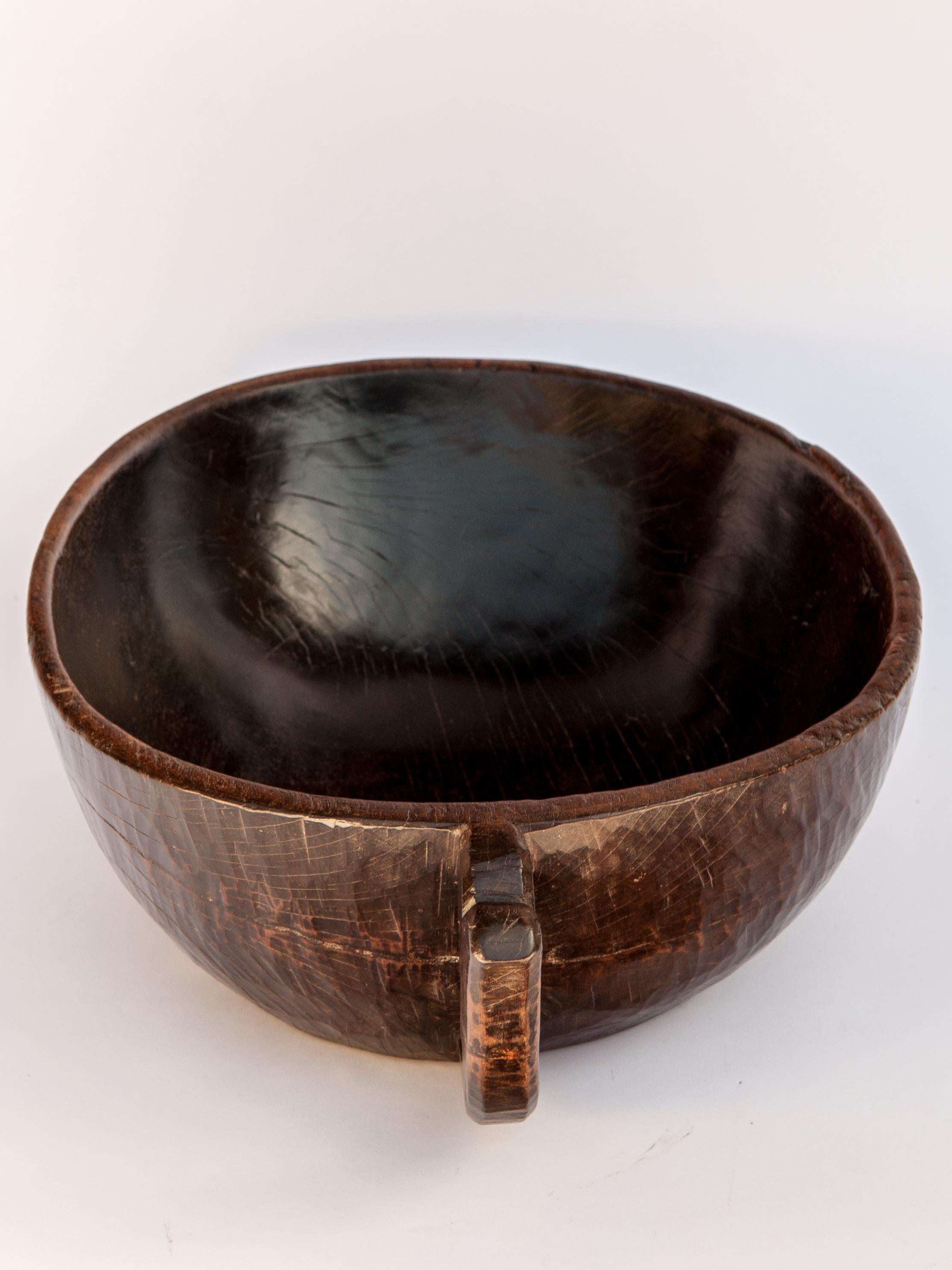 Hand Hewn Wooden Bowl with Handle from Sulawesi, Indonesia, Mid-20th Century In Good Condition In Point Richmond, CA